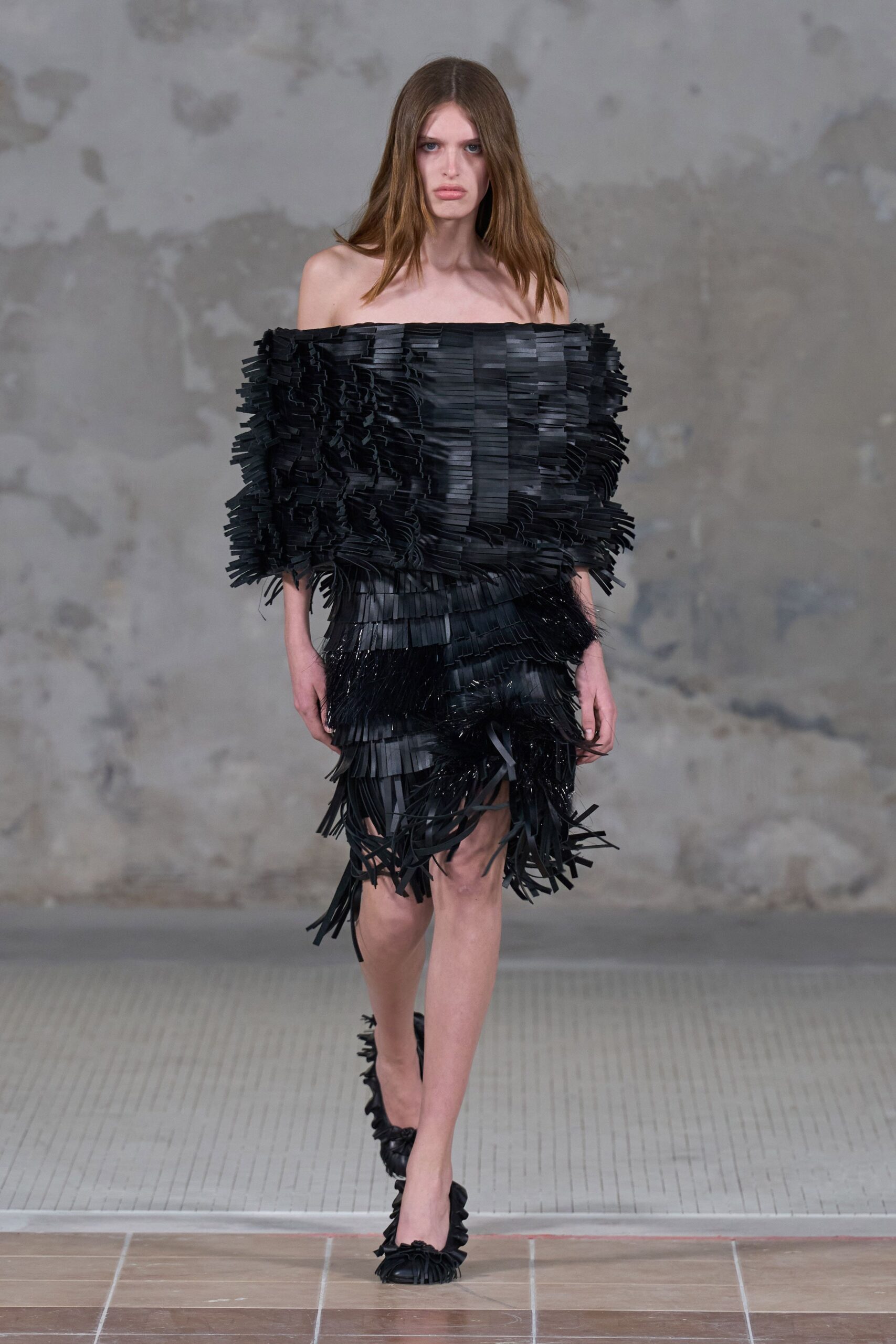 black fringed off-shoulder dress