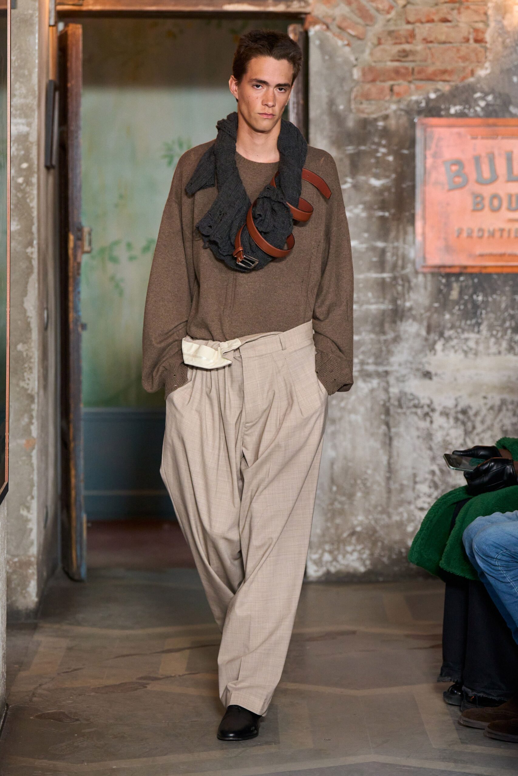 brown relaxed sweater with beige pants