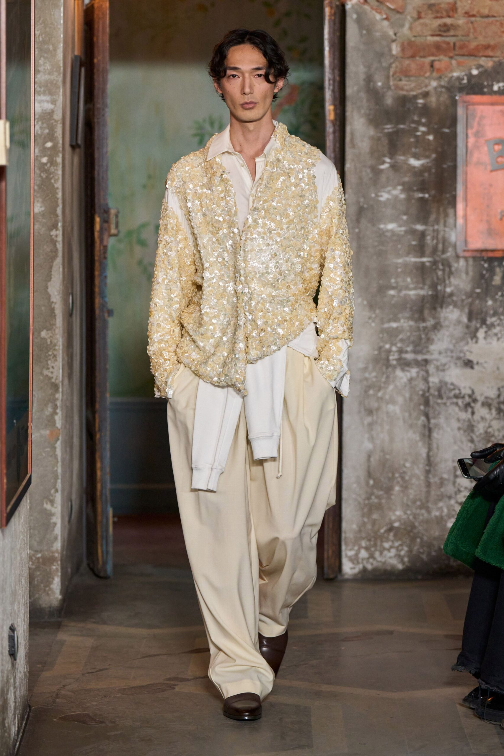 relaxed white and gold shirt with beige pants