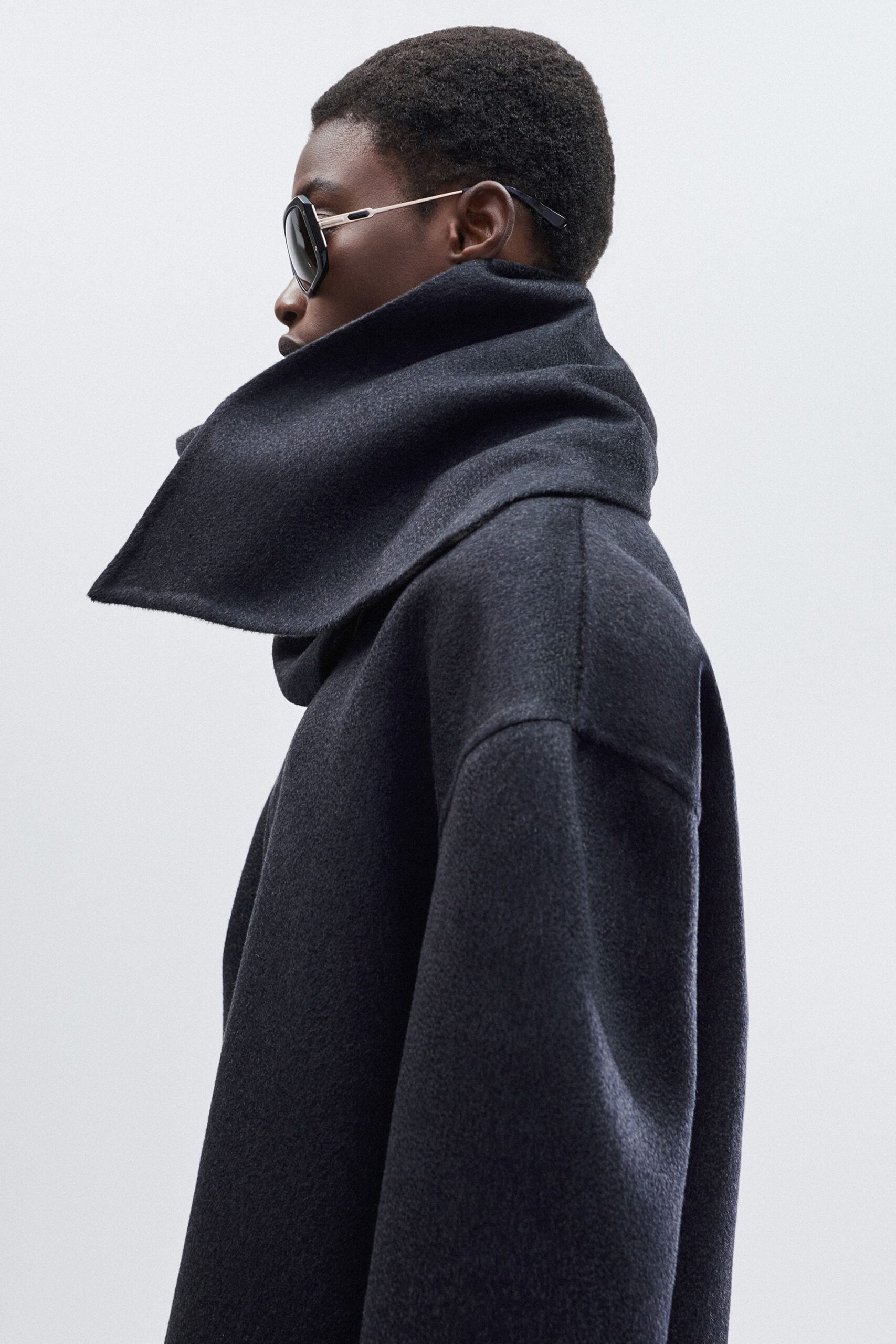 black wool long-sleeve high-neck oversized structured coat