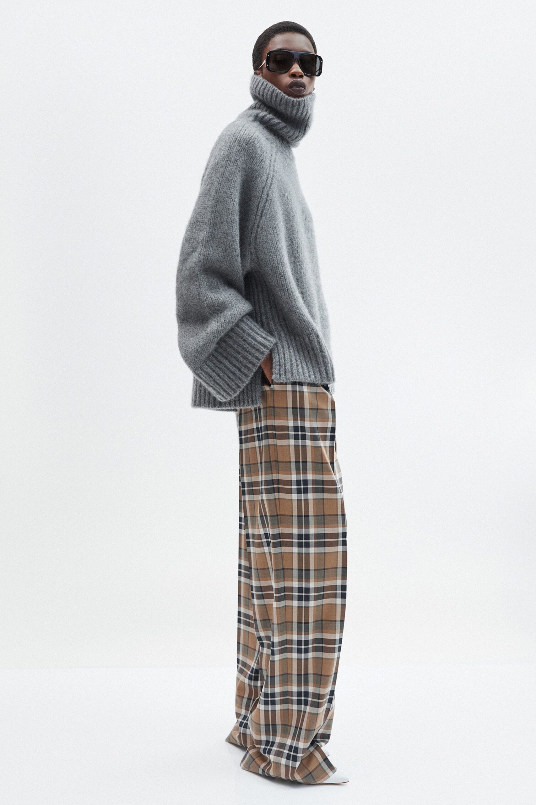 gray oversized sweater with checked pants