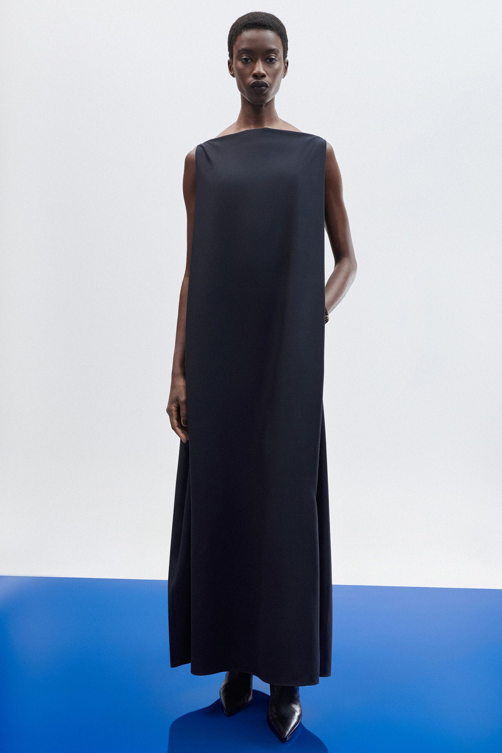 black silk sleeveless high-neck relaxed straight-leg maxi gown