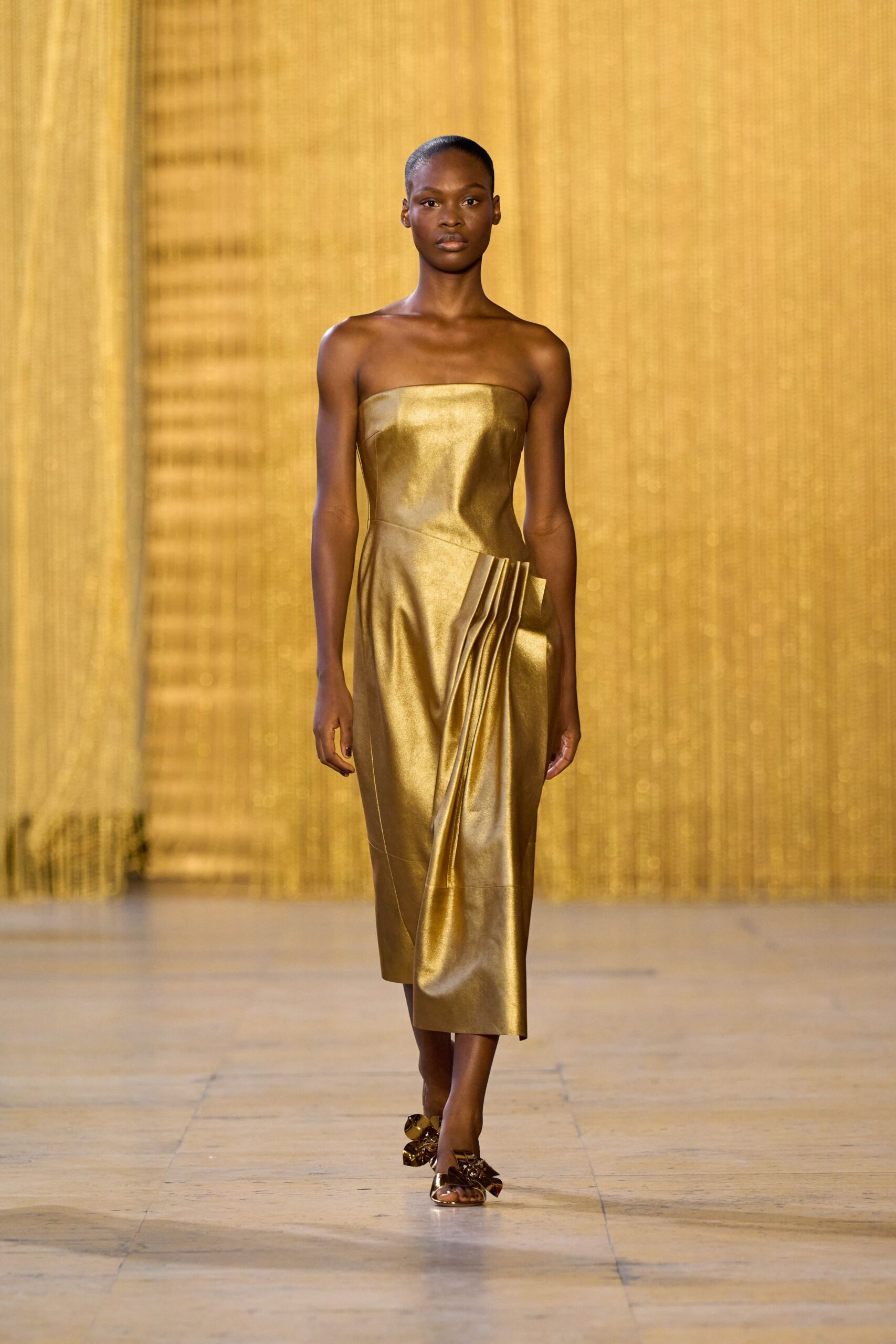 gold silk strapless fitted pleated shiny midi dress