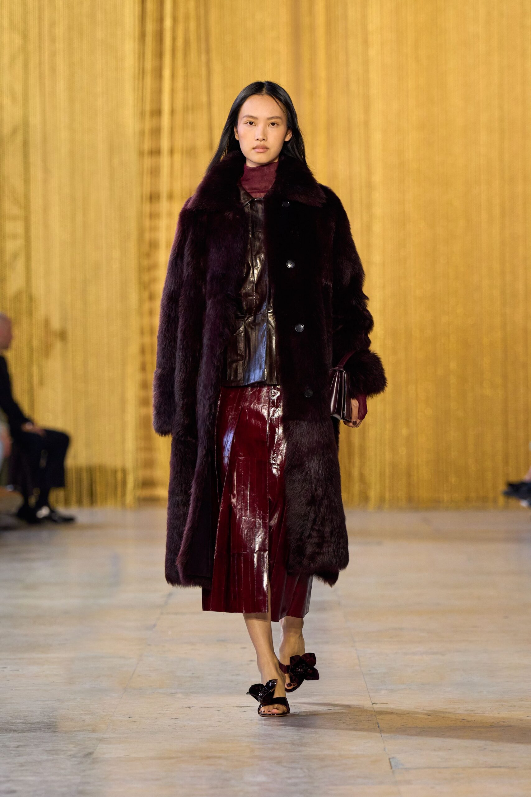 purple fur coat with leather top