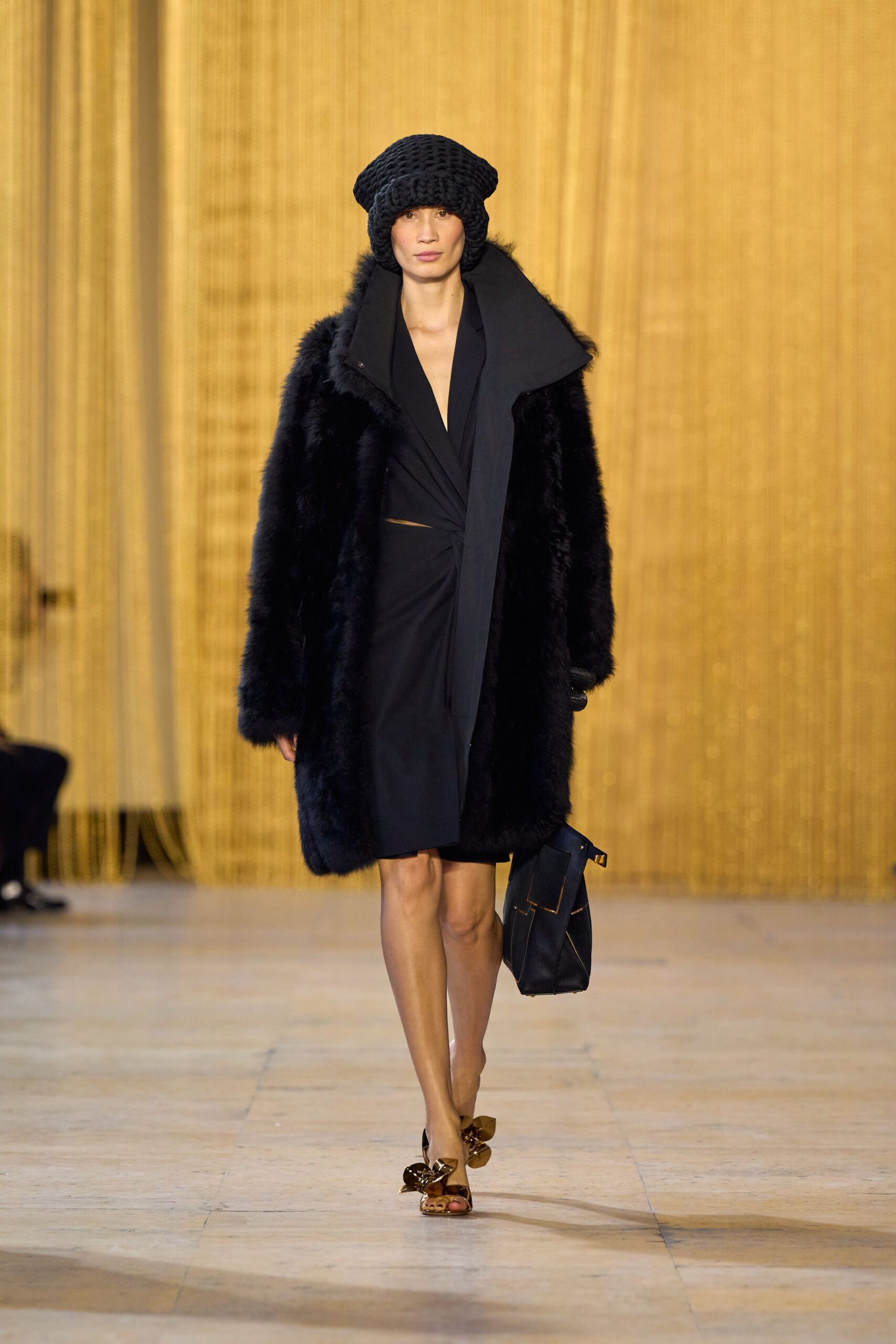 black fur coat black dress
