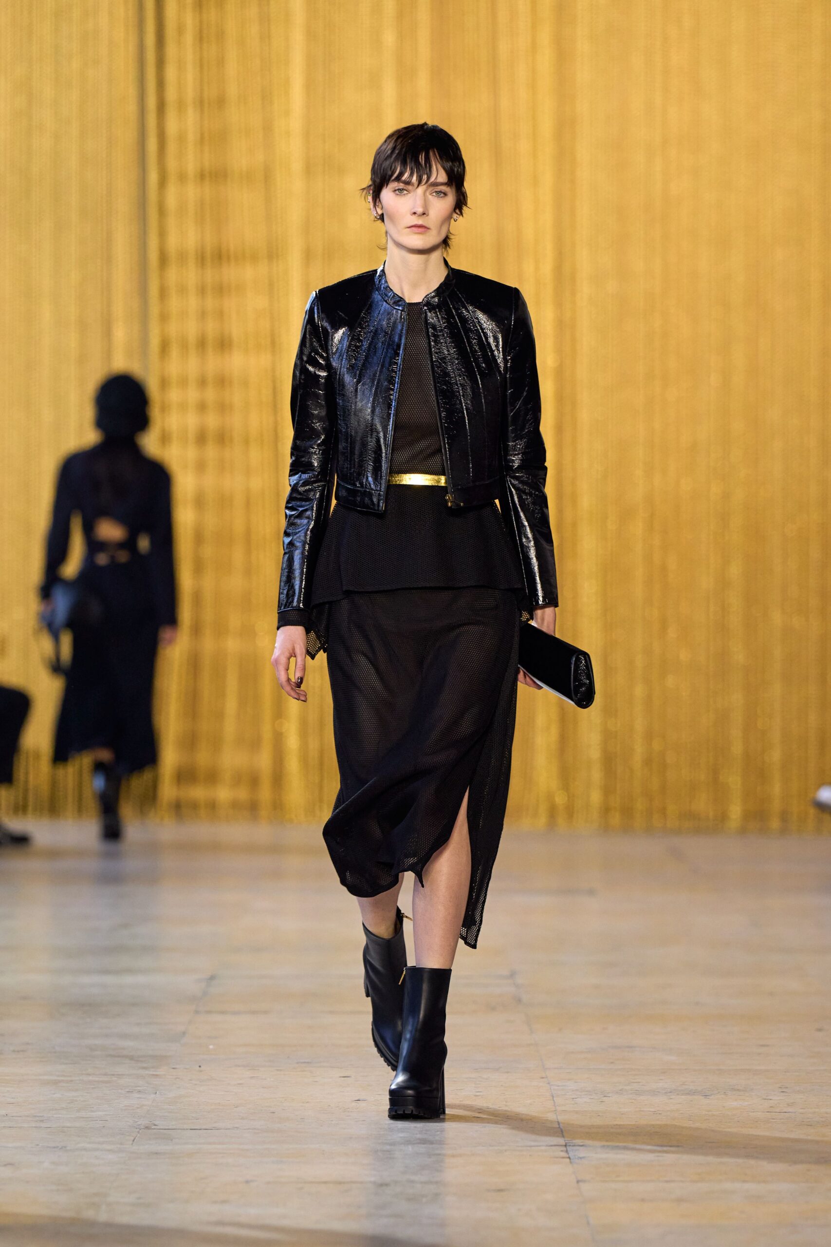 black leather long-sleeve collared fitted zippered shiny jacket