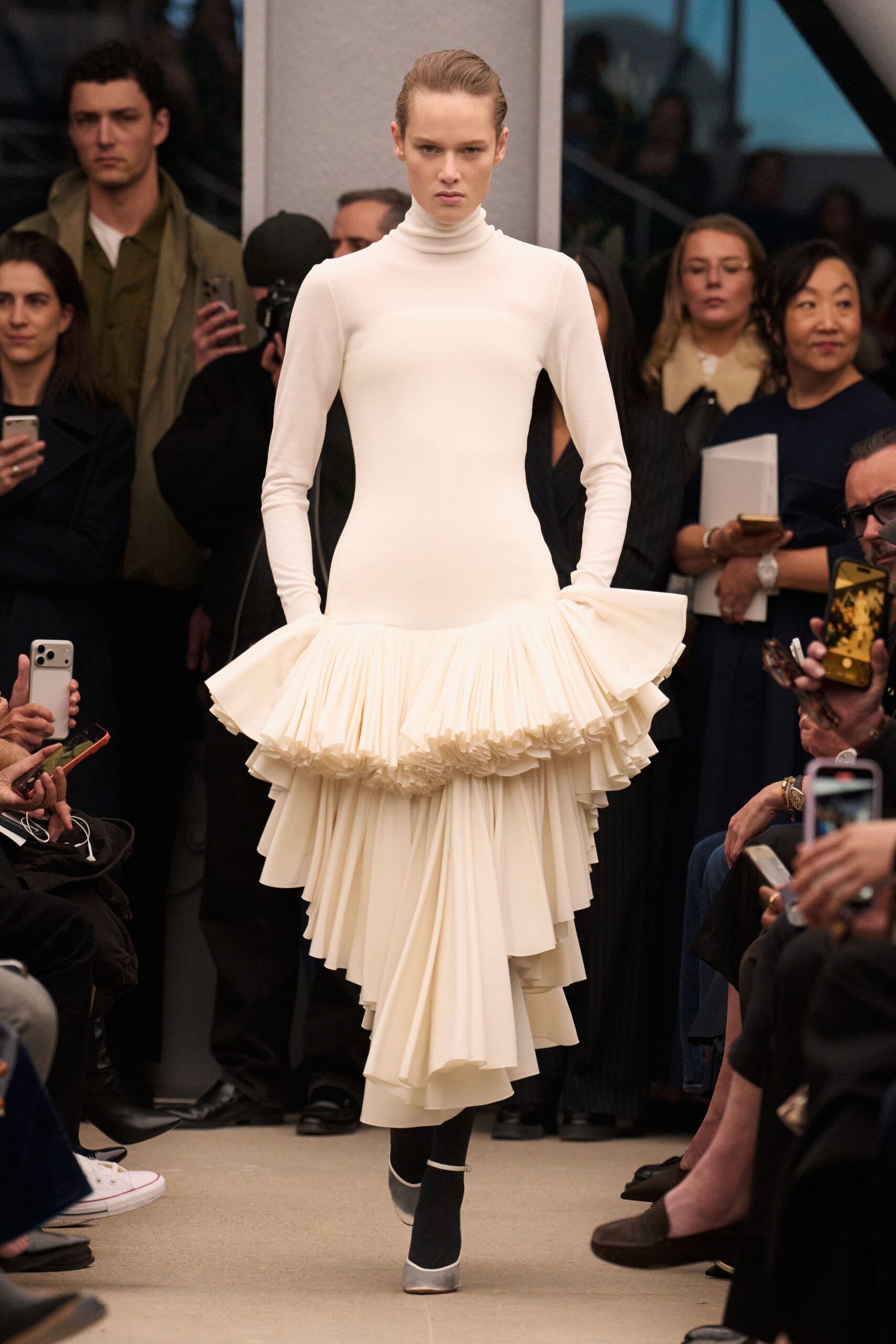 white pleated midi dress with black shoes
