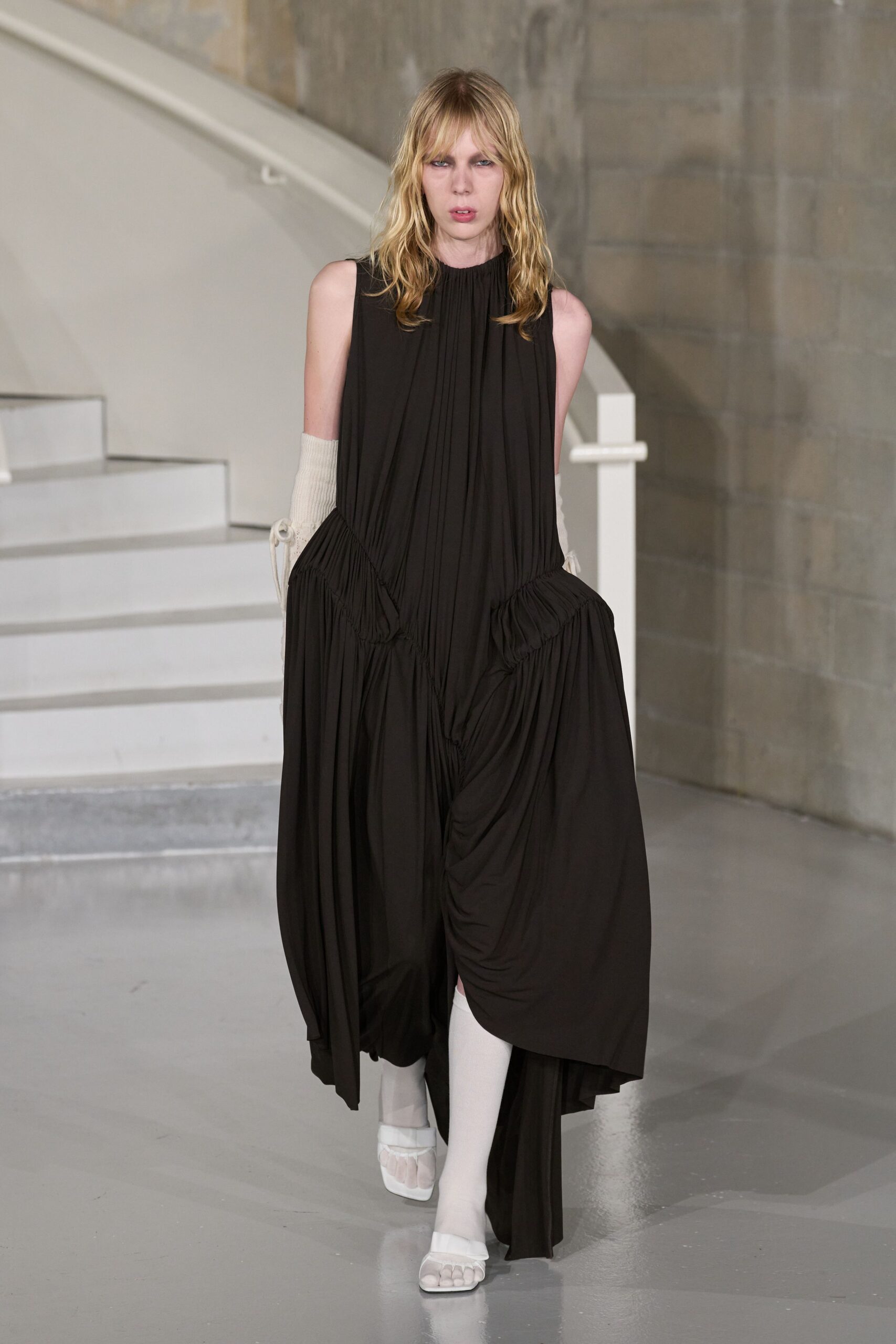 black silk sleeveless high-neck relaxed draped pleated dress