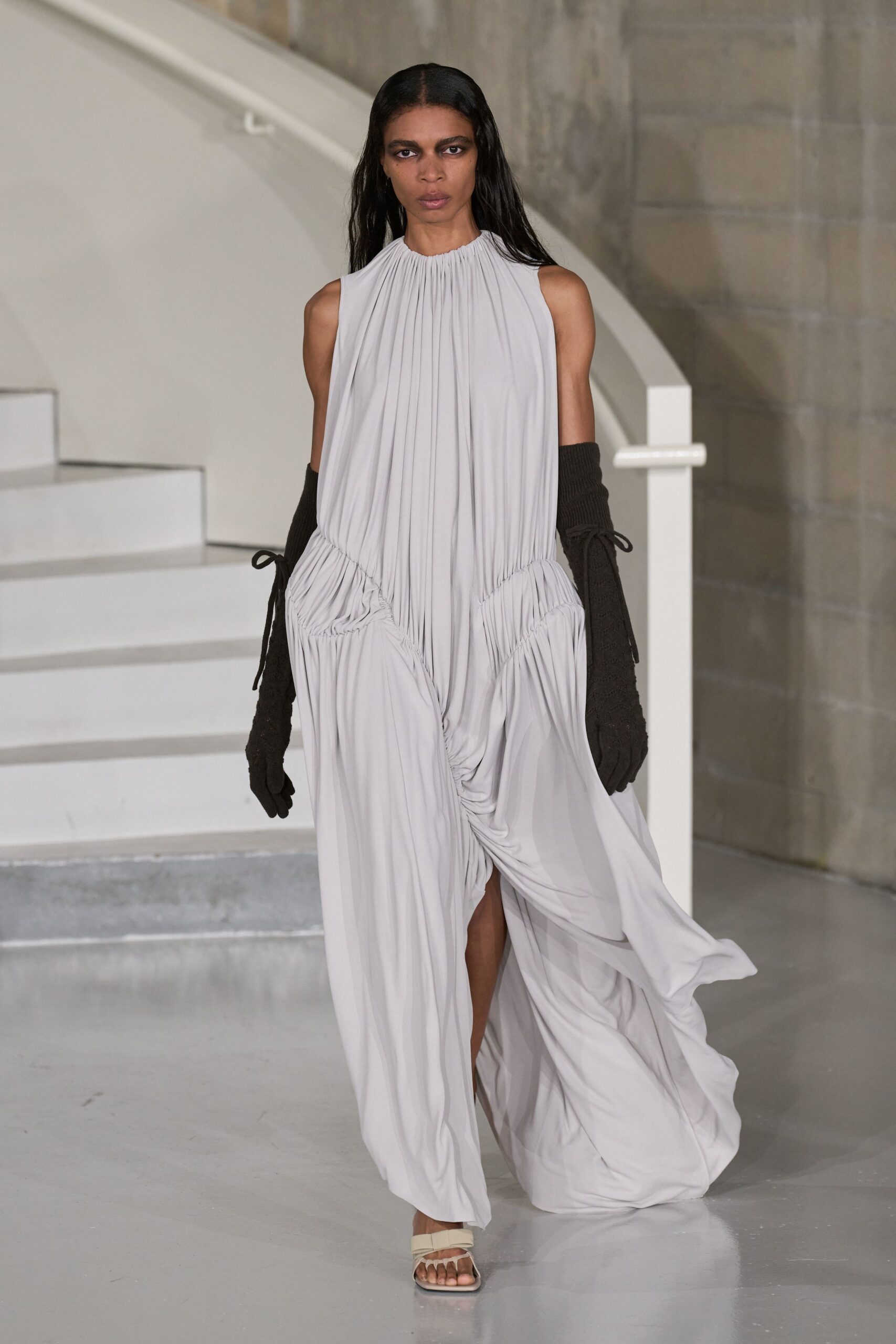 gray silk sleeveless high-neck relaxed draped flowing gown