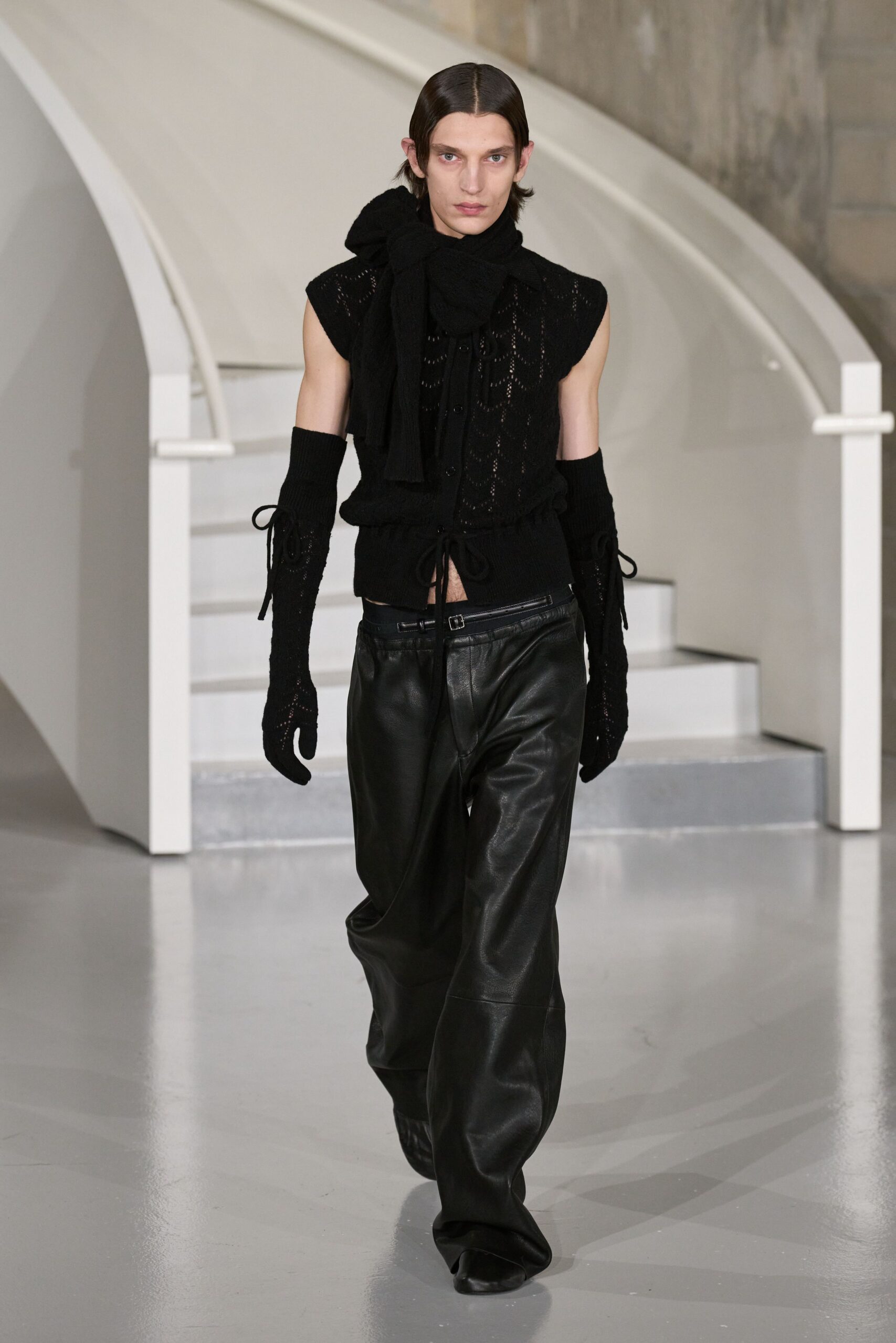 black fitted top and relaxed pants