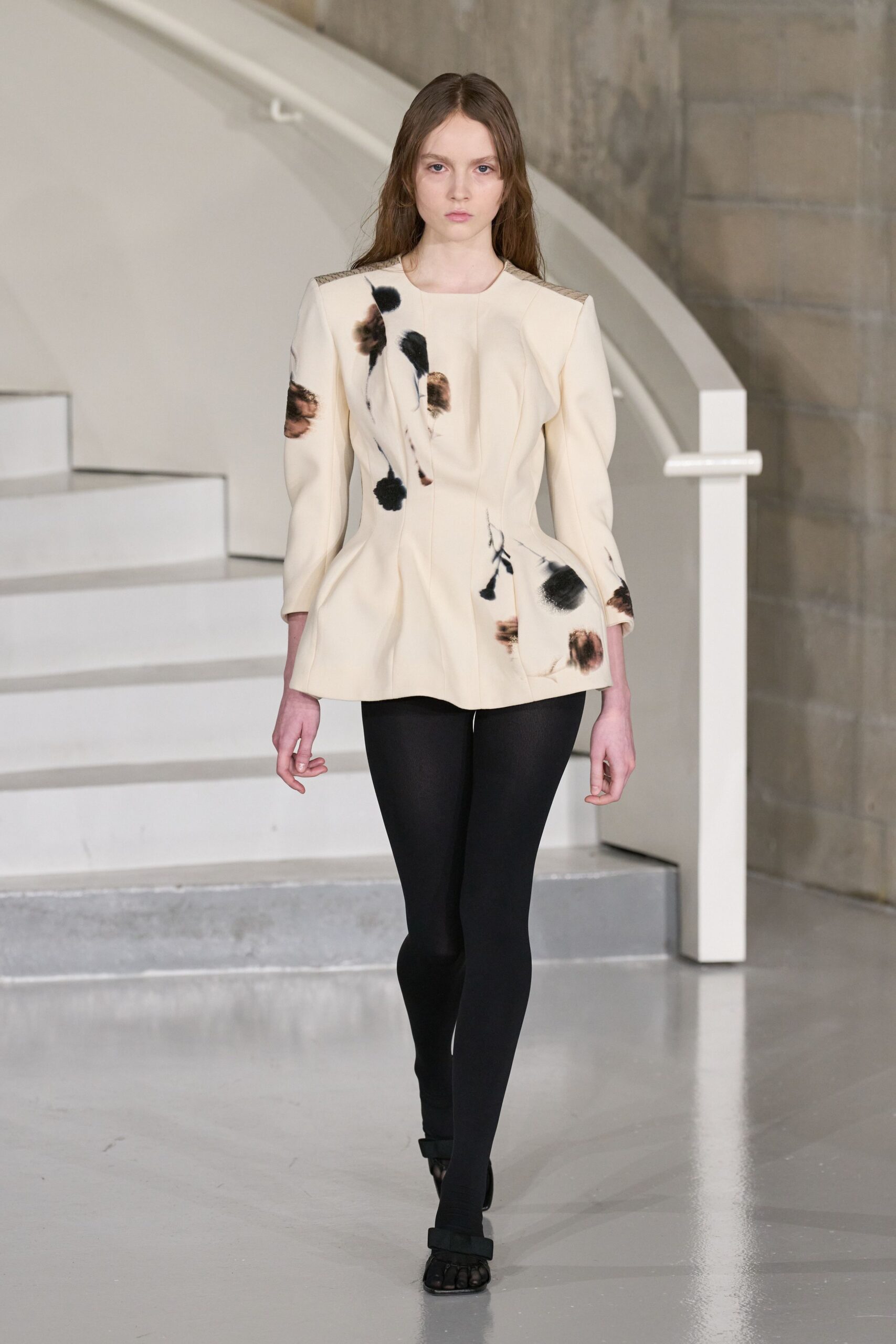 white fitted top with embroidery