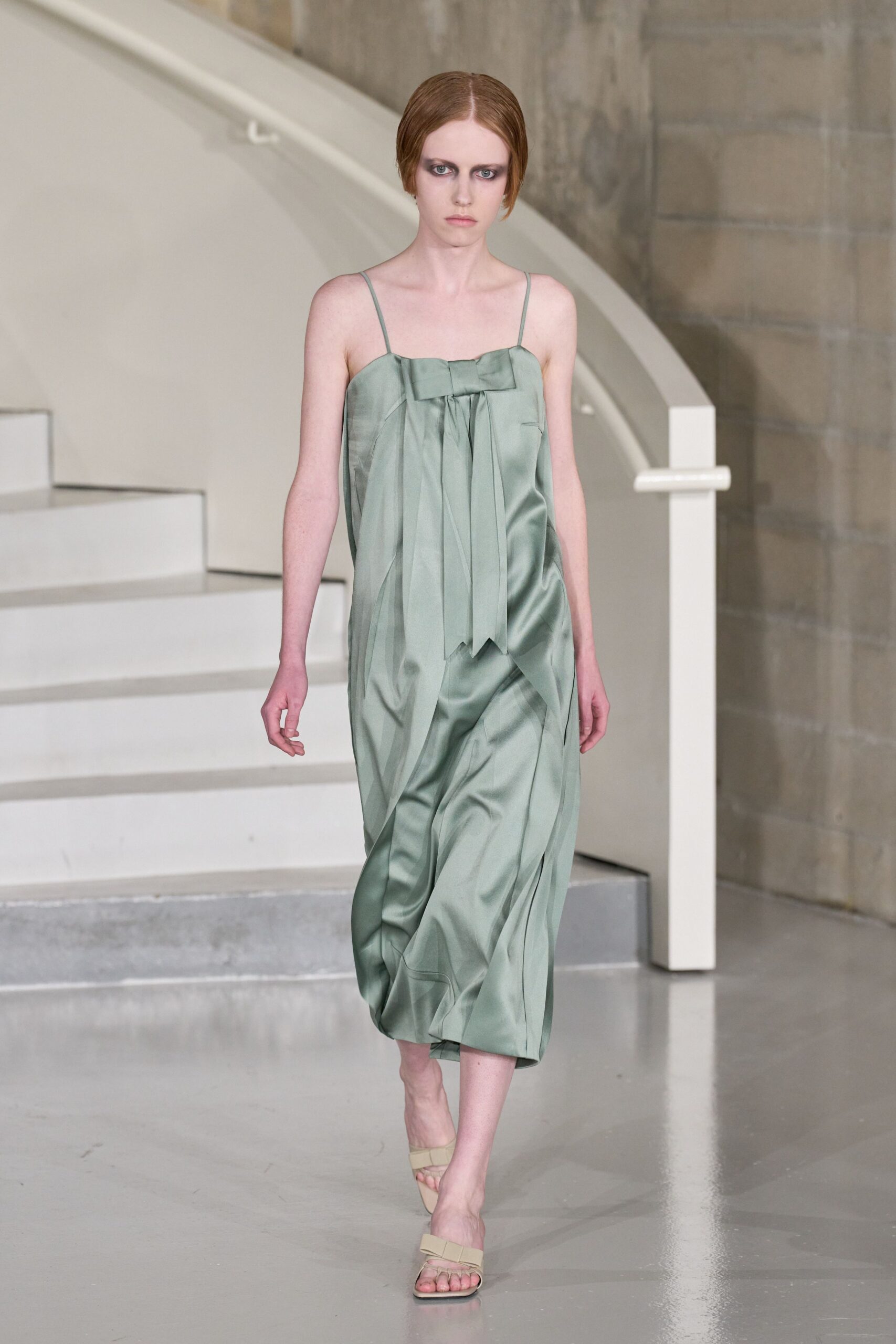 green silk sleeveless v-neck fitted draped flowing dress