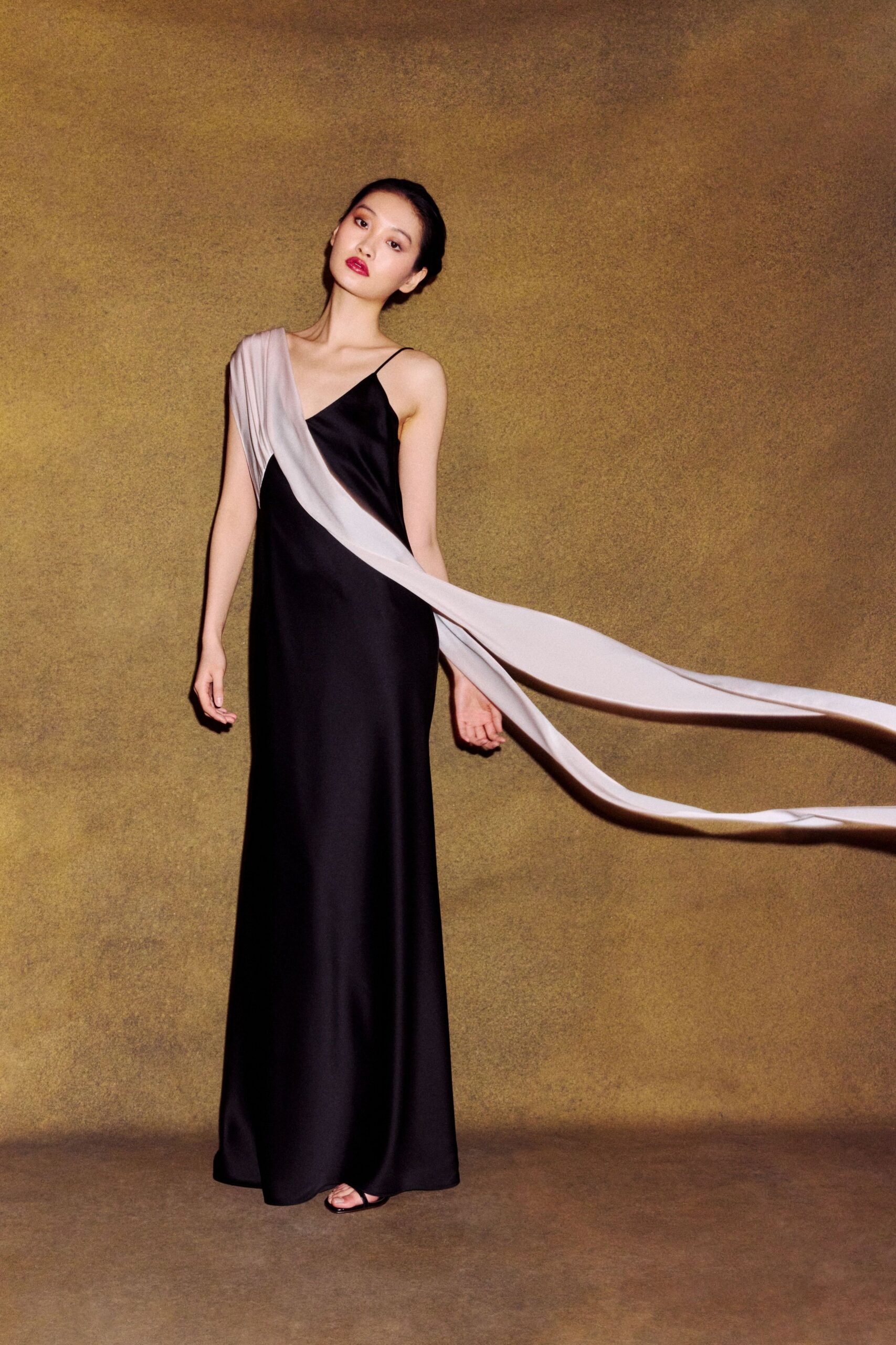 black and white draped gown