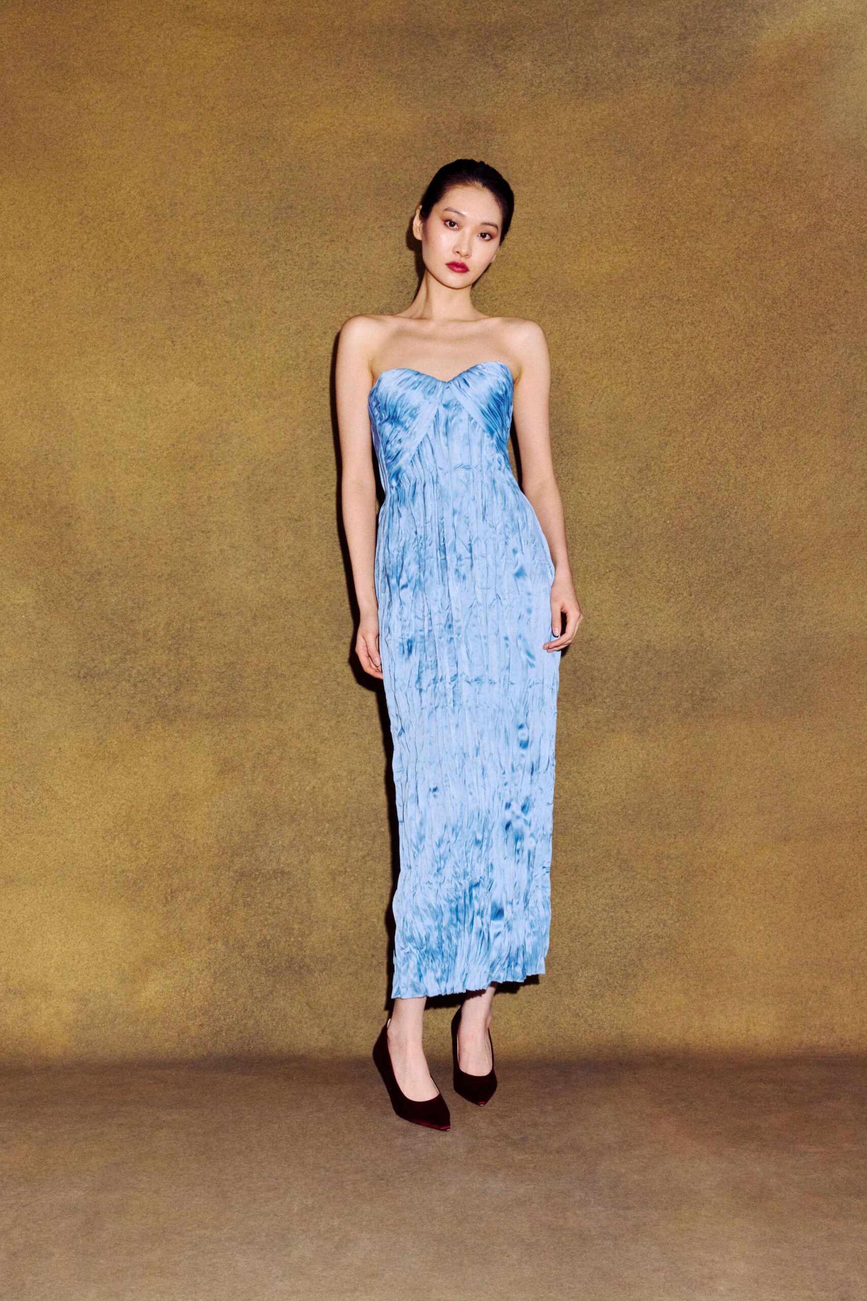 blue silk strapless fitted pleated flowing maxi gown