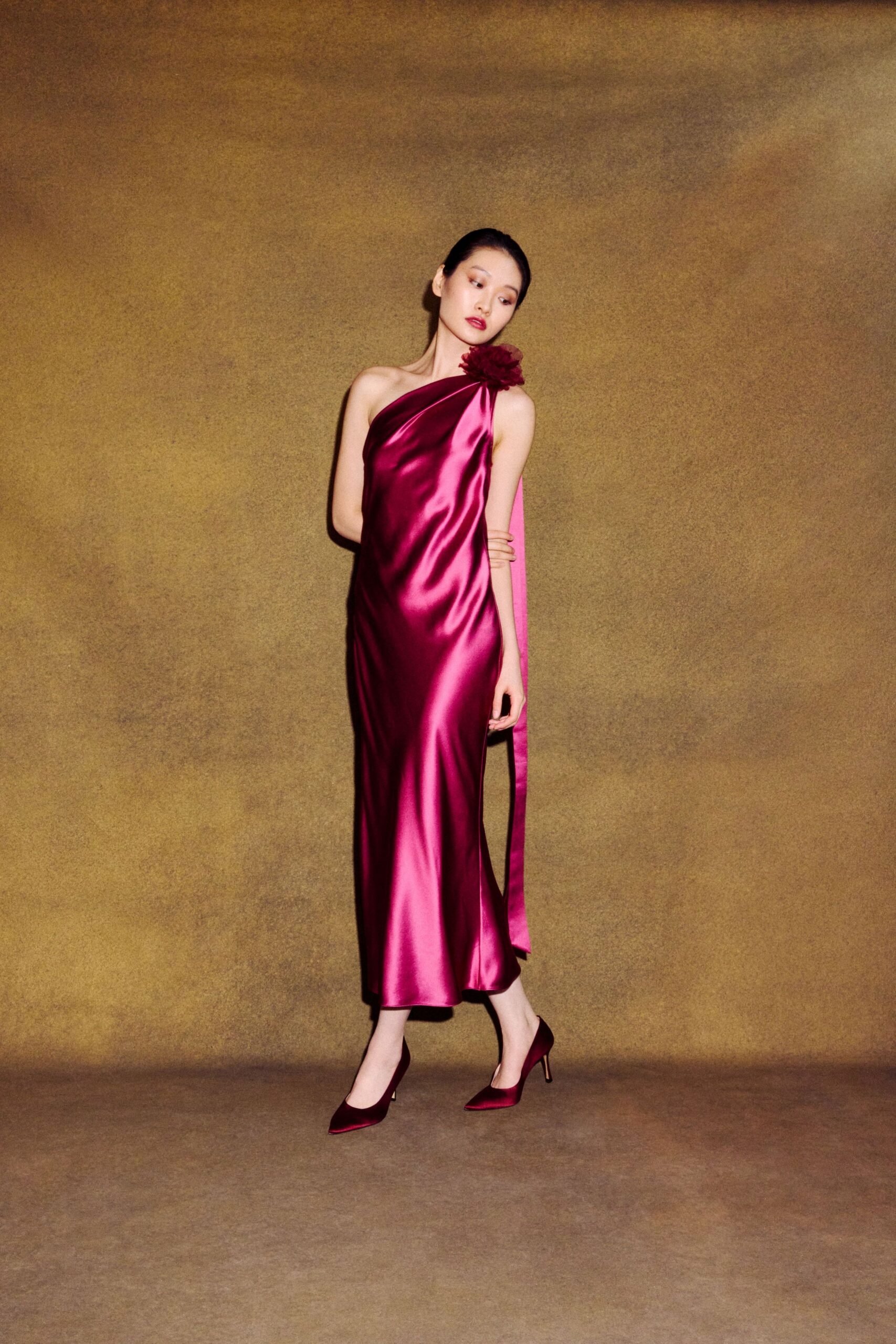 maroon silk sleeveless off-shoulder fitted draped shiny gown