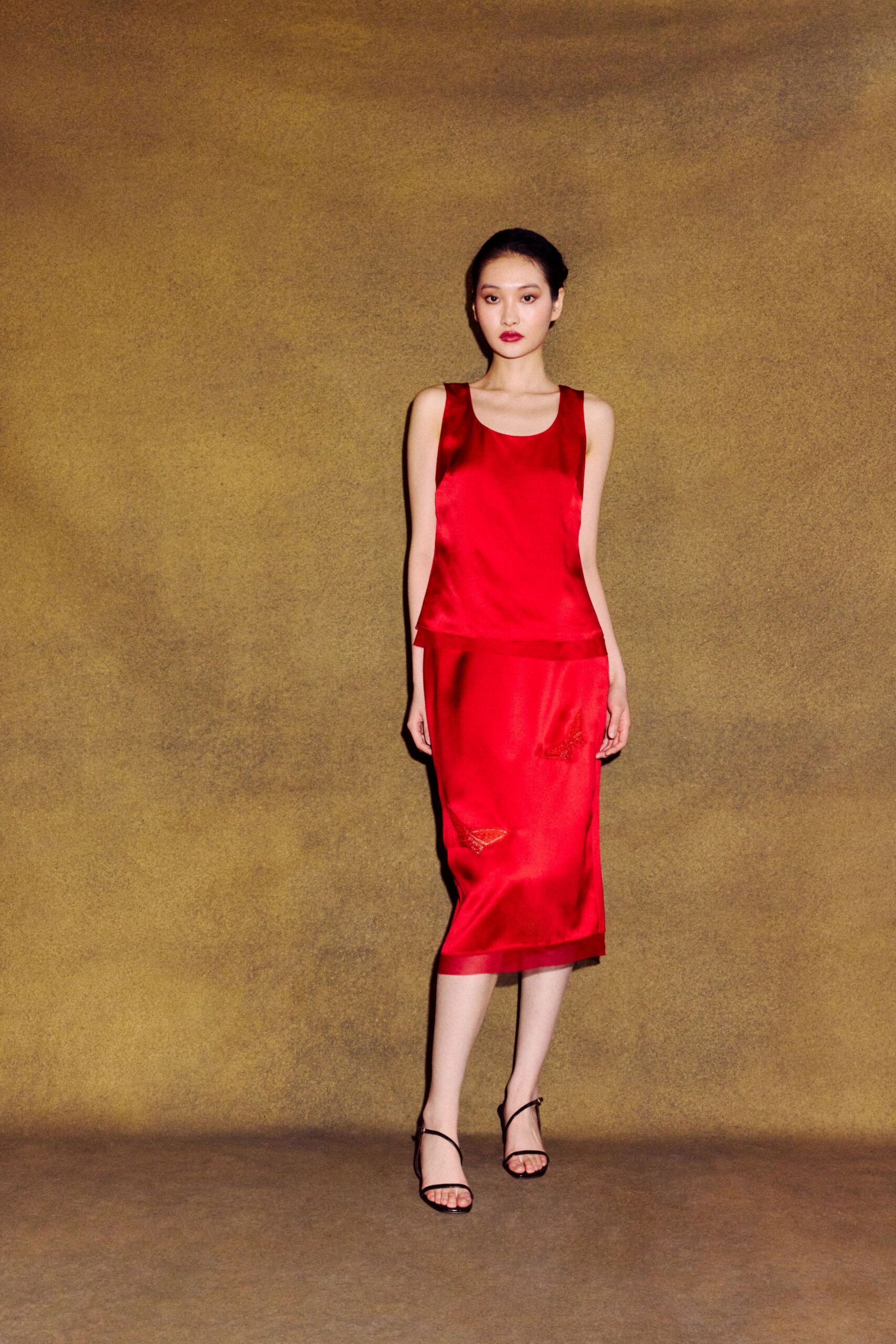 red silk sleeveless v-neck fitted shiny midi dress
