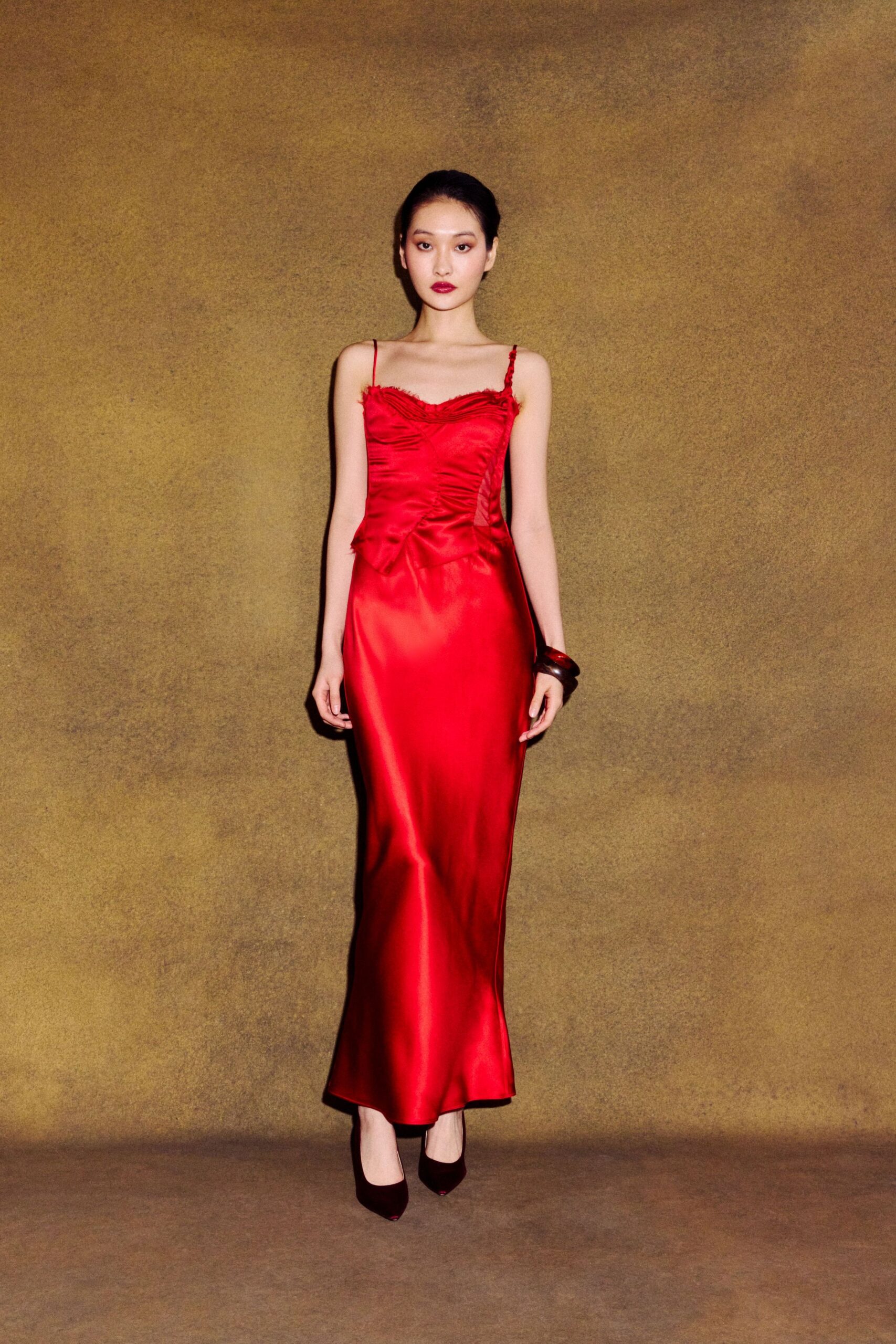 red silk sleeveless v-neck fitted ruched shiny gown