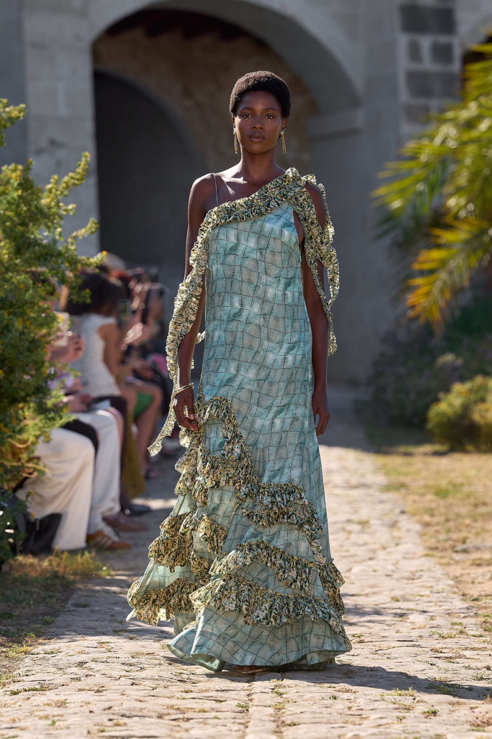 green silk off-shoulder gown