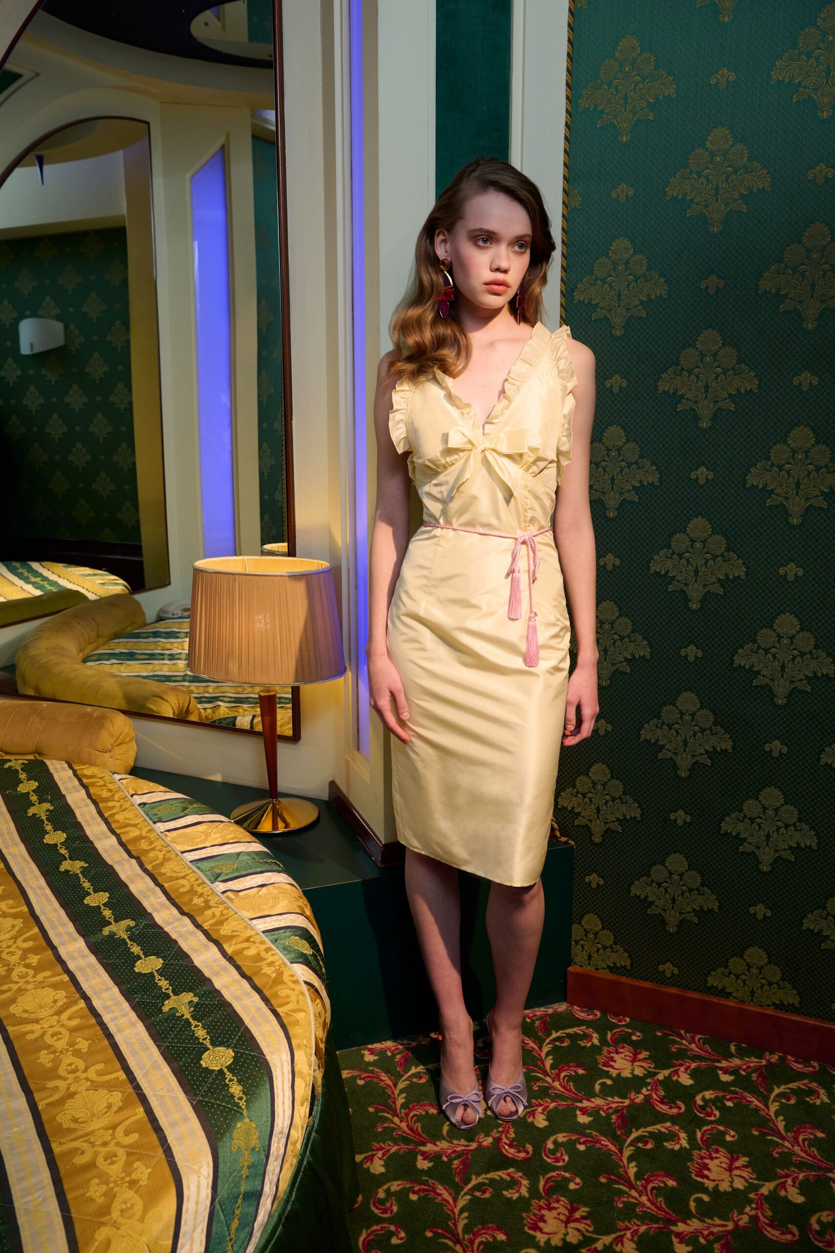 yellow silk sleeveless v-neck fitted ruffled belted dress