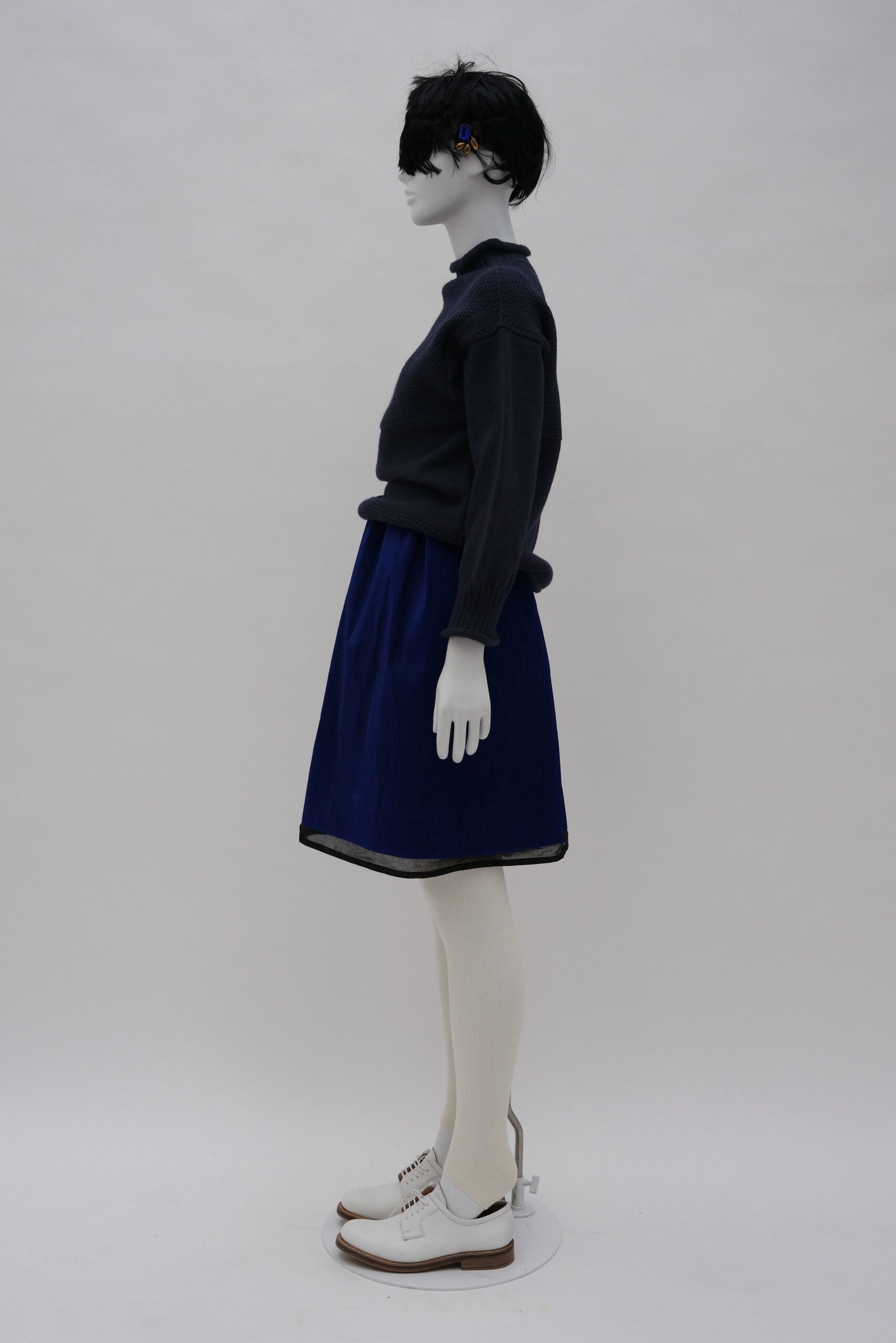 navy sweater blue skirt white shoes