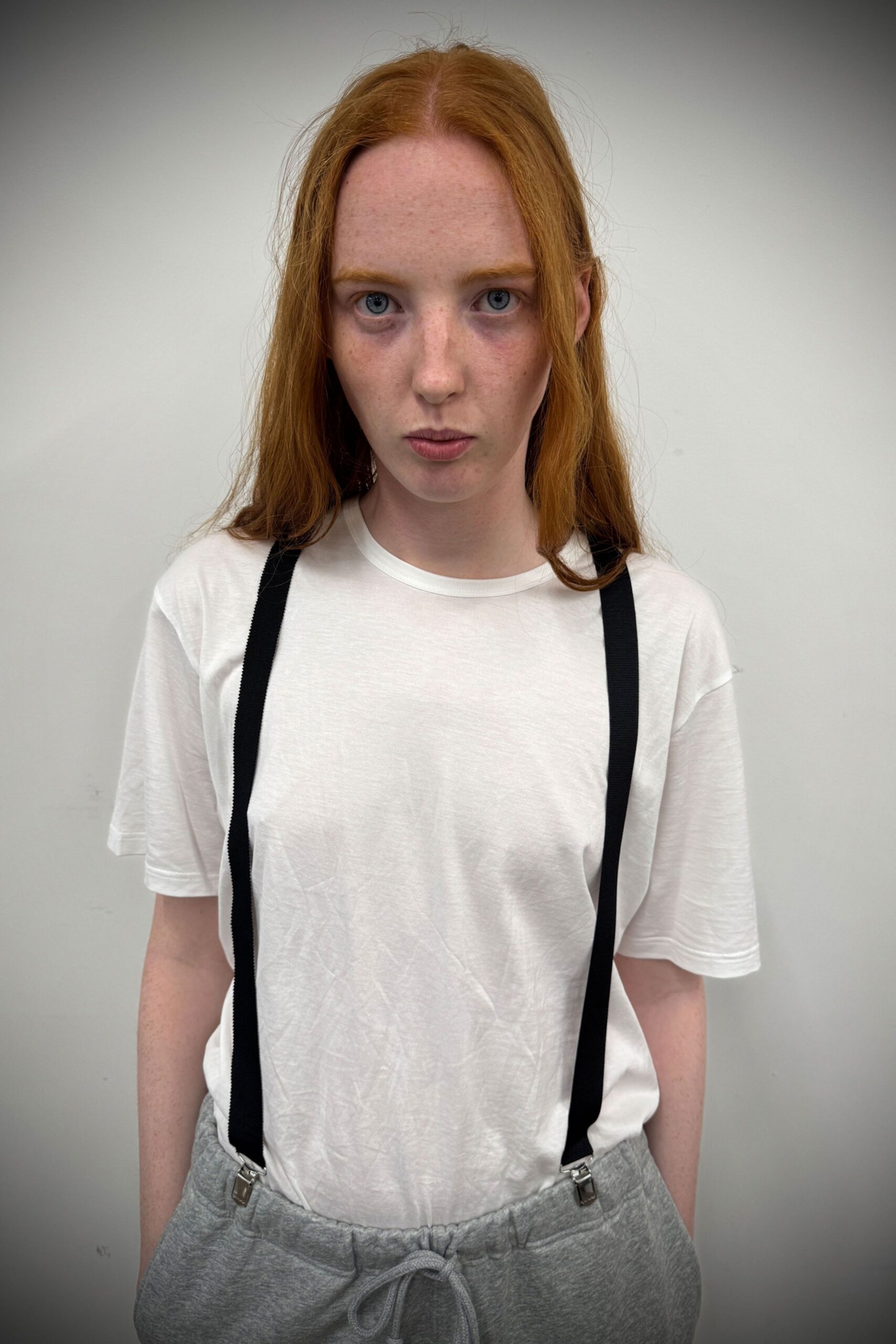 white t-shirt and gray pants