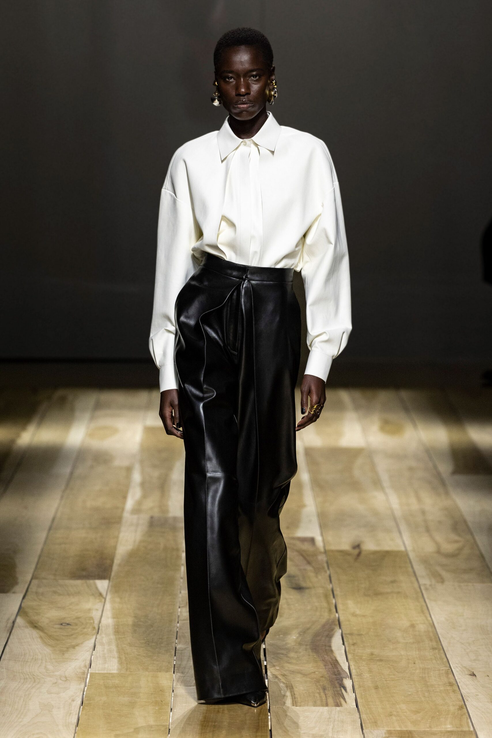 black leather fitted pleated pants