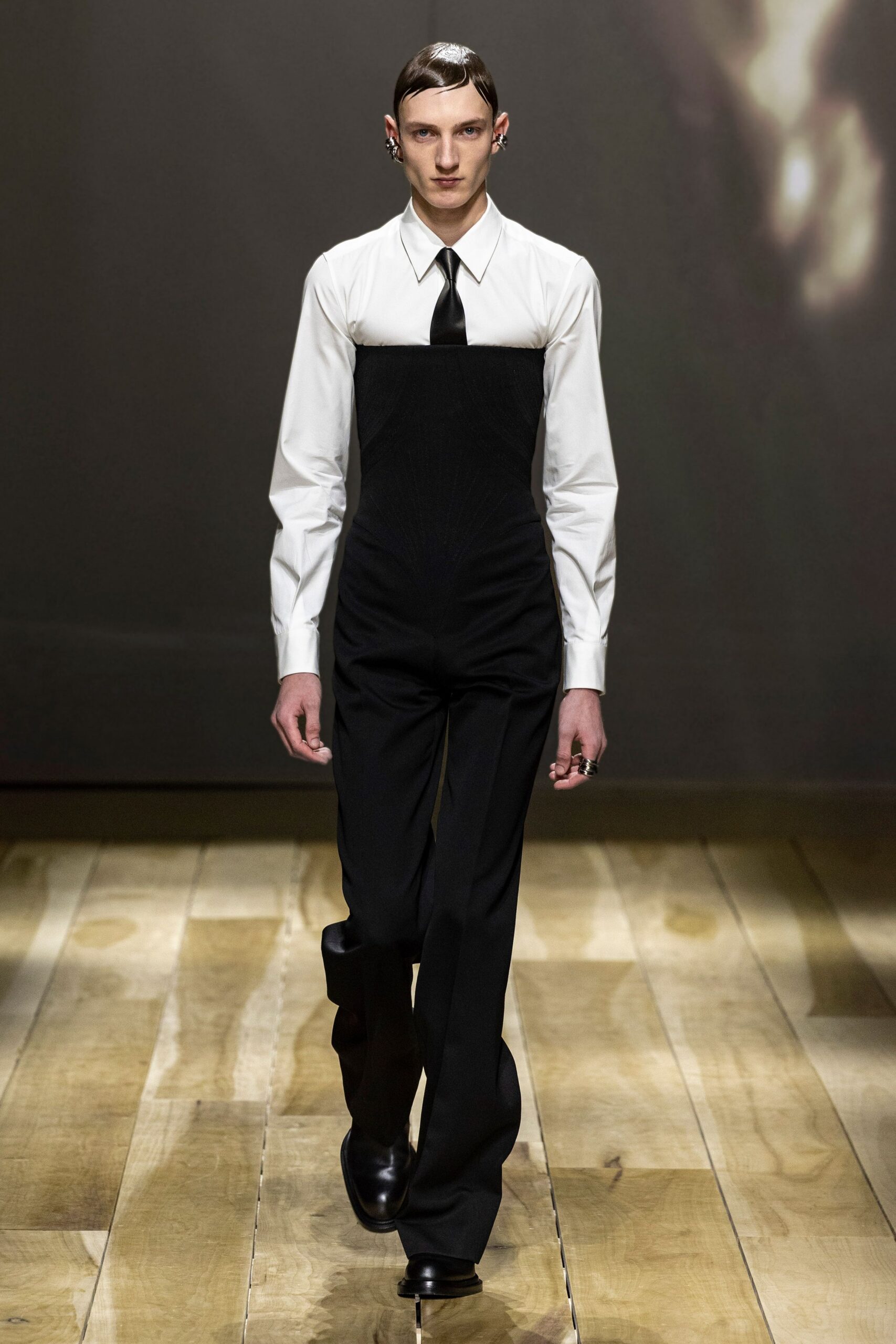 black fitted pants and white shirt