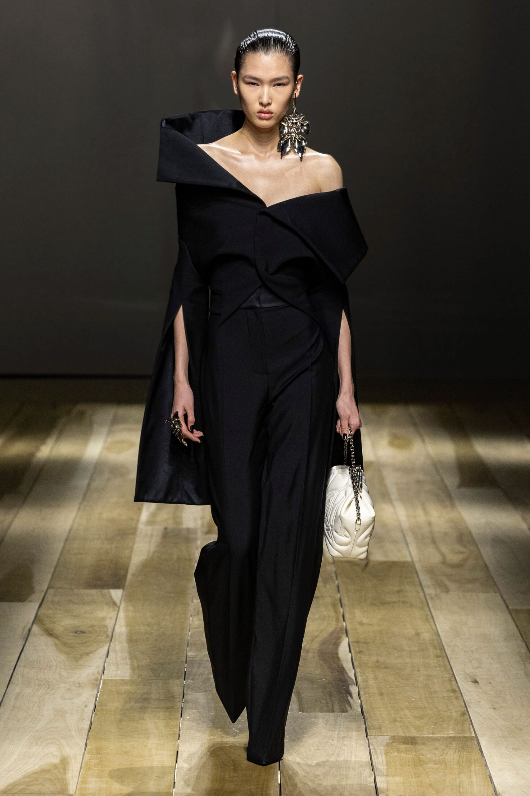 black silk long-sleeve off-shoulder fitted structured jumpsuit