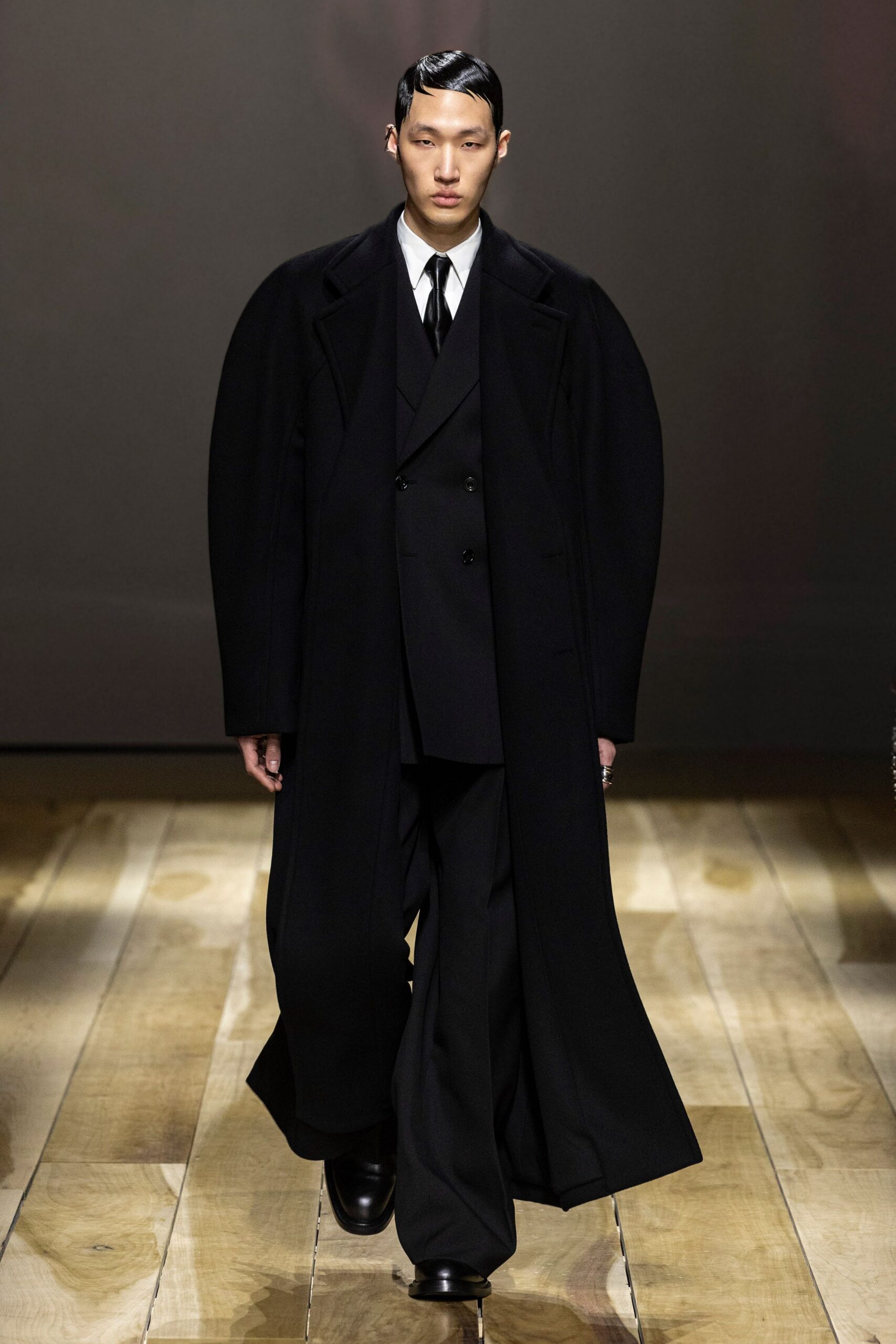 black wool long-sleeve collared oversized layered maxi coat