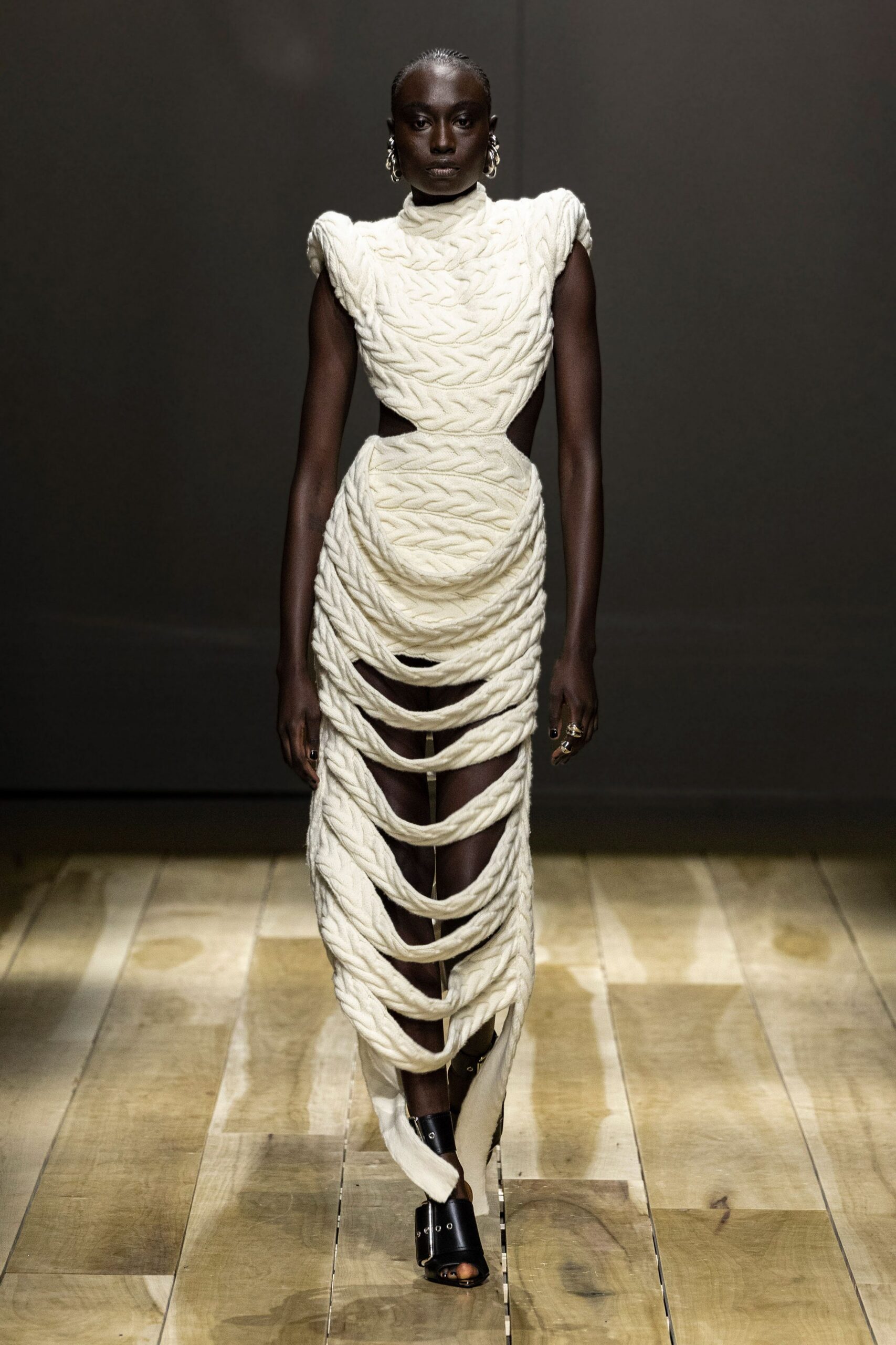 white cotton sleeveless high-neck fitted pleated draped gown