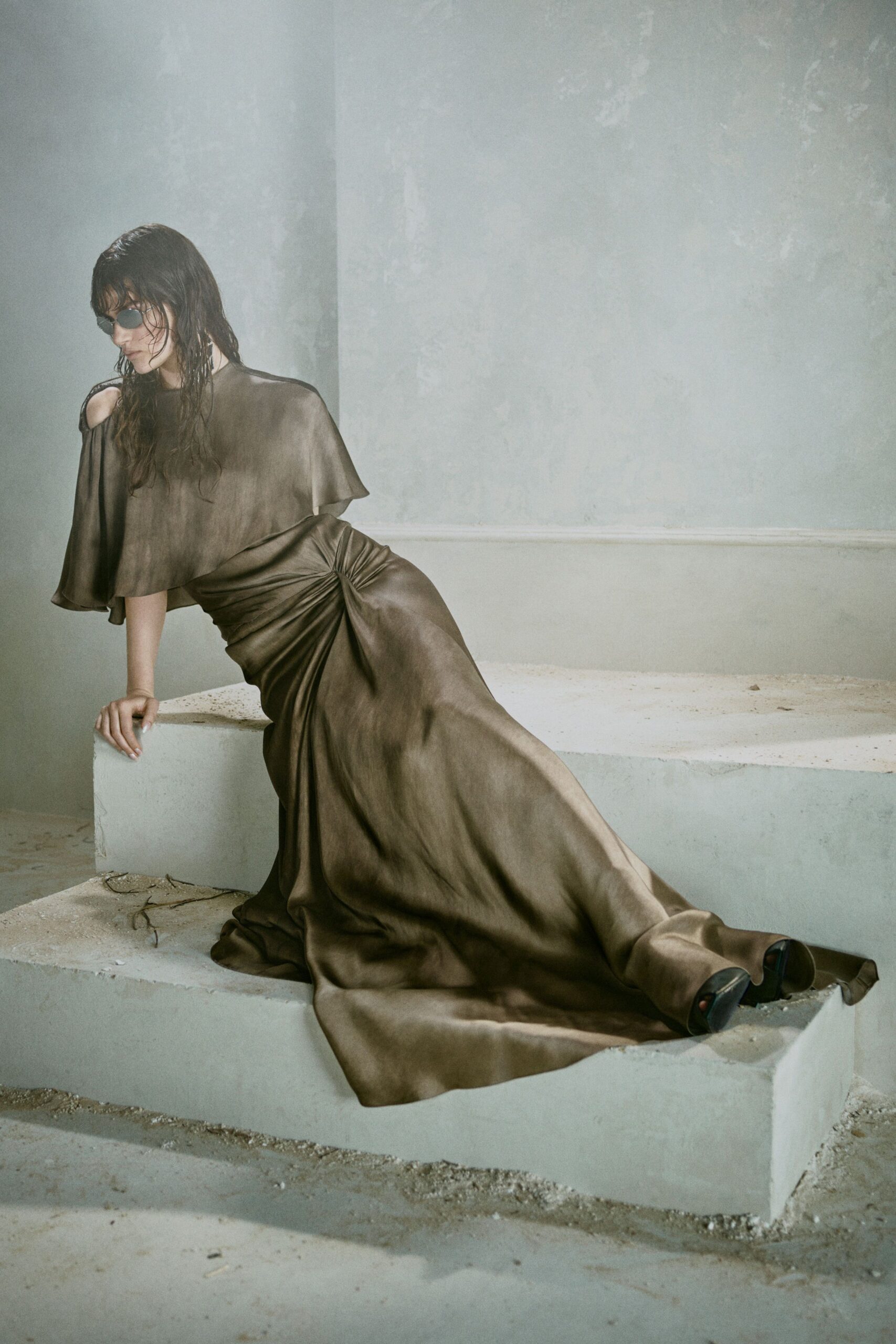 brown silk off-shoulder fitted draped flowing maxi gown