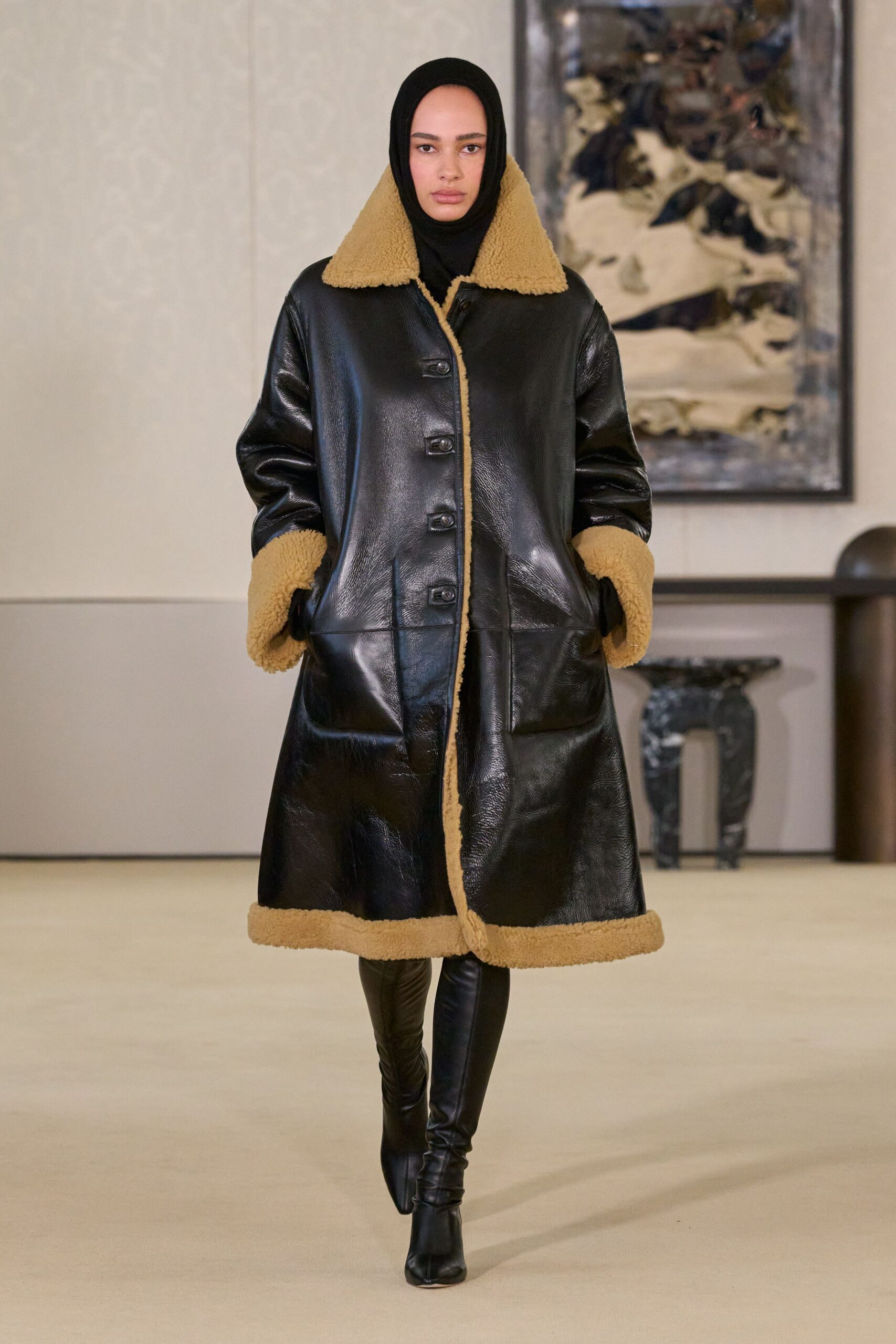 black leather long-sleeve collared fitted buttoned coat