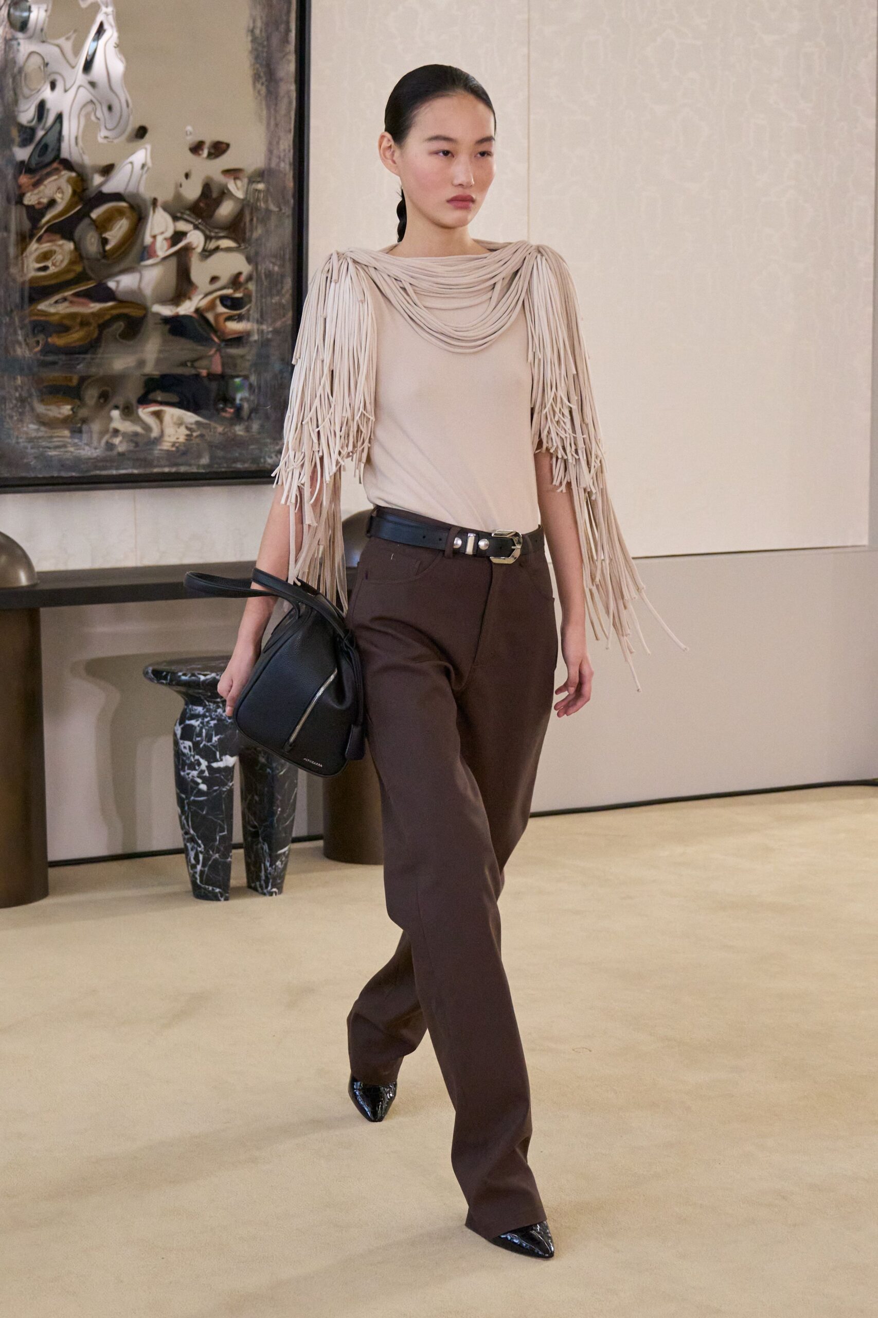 beige fringed top with brown pants