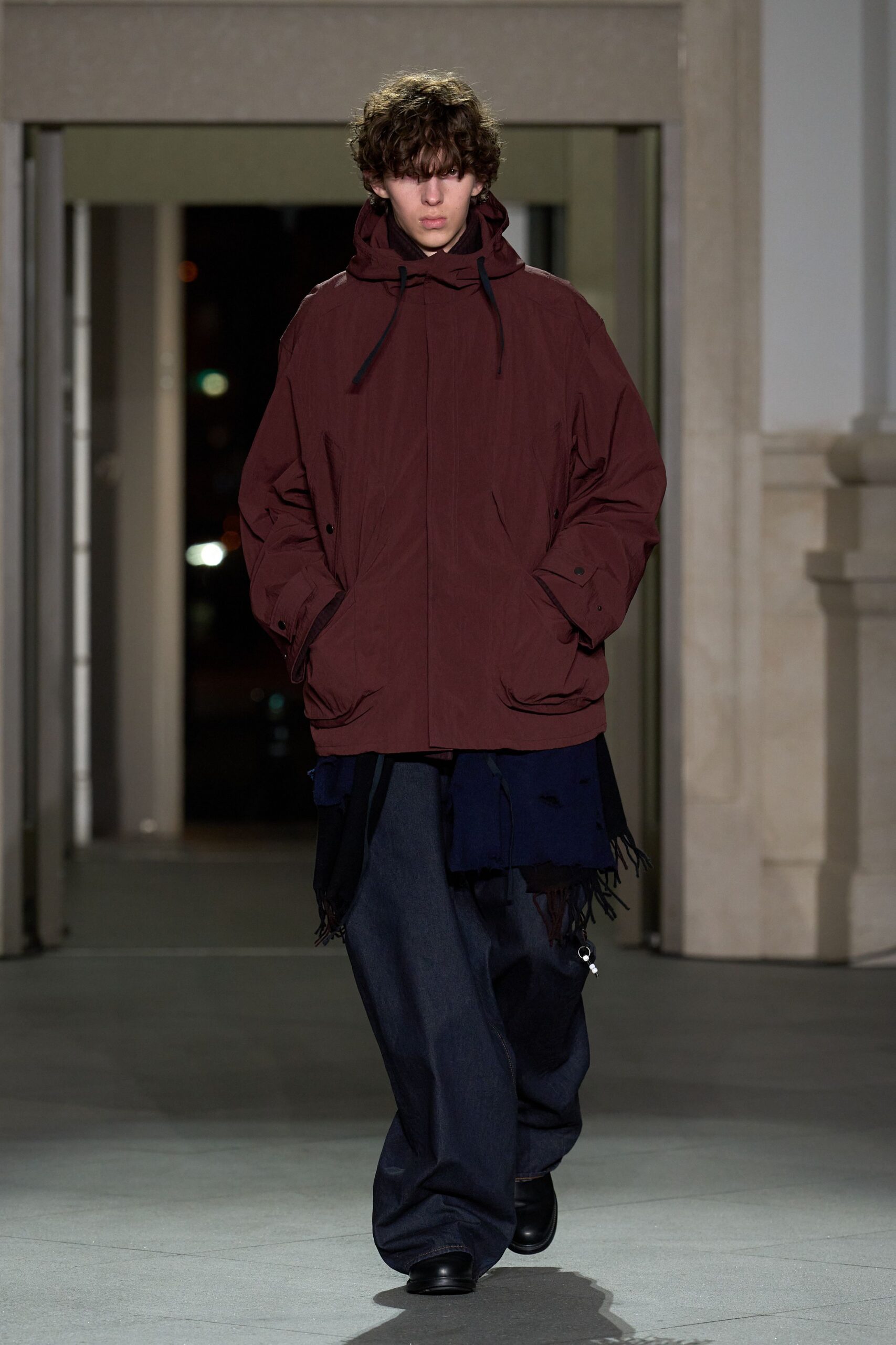 red hooded jacket with blue pants