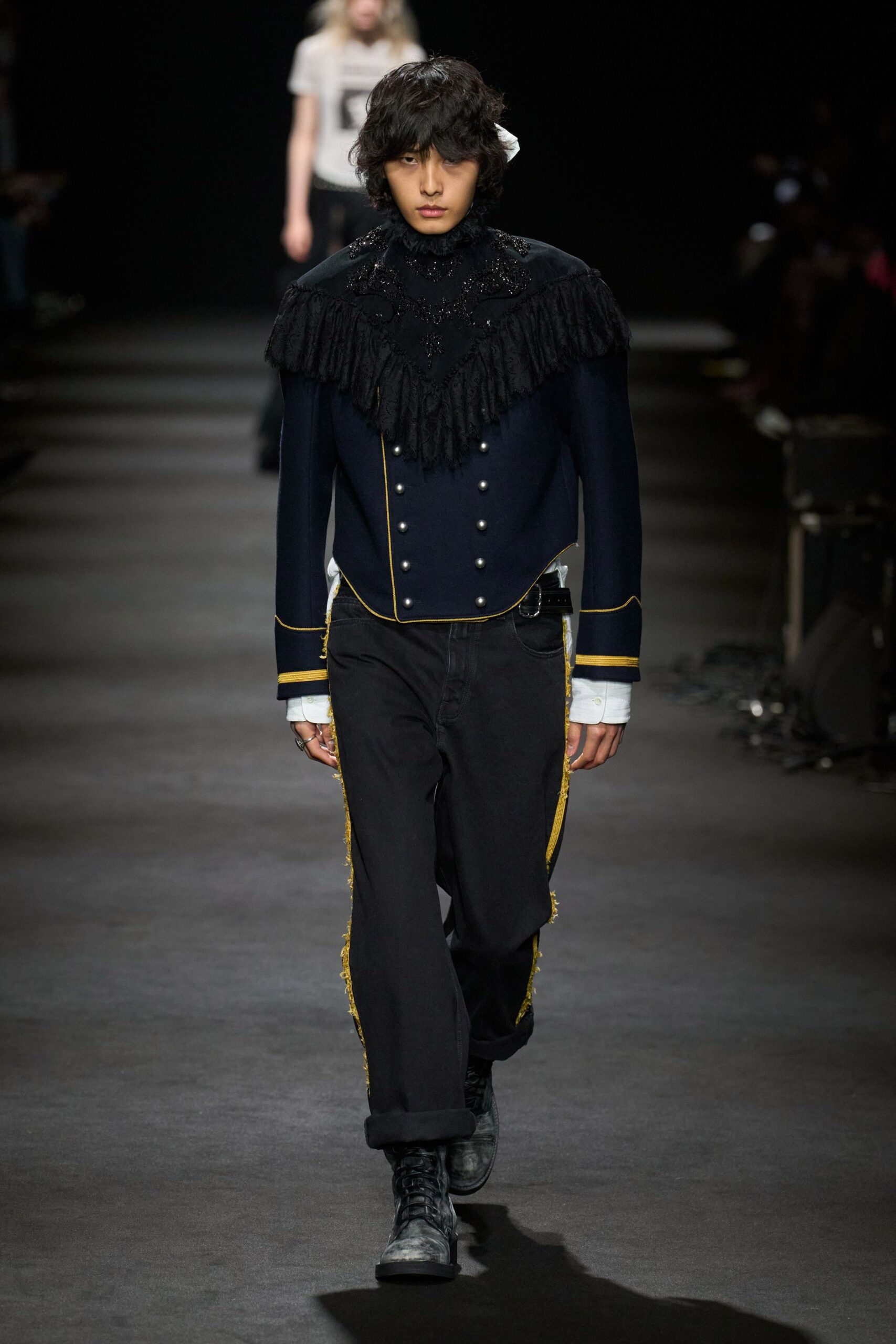 black fitted jacket with fringes