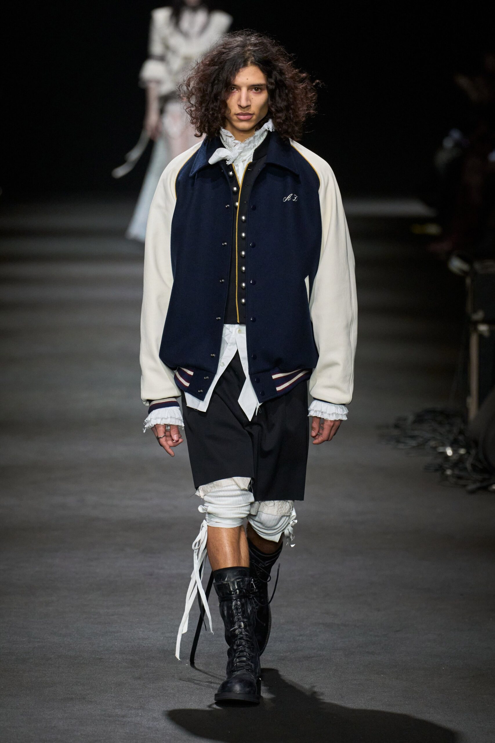 navy and white relaxed jacket with black shorts