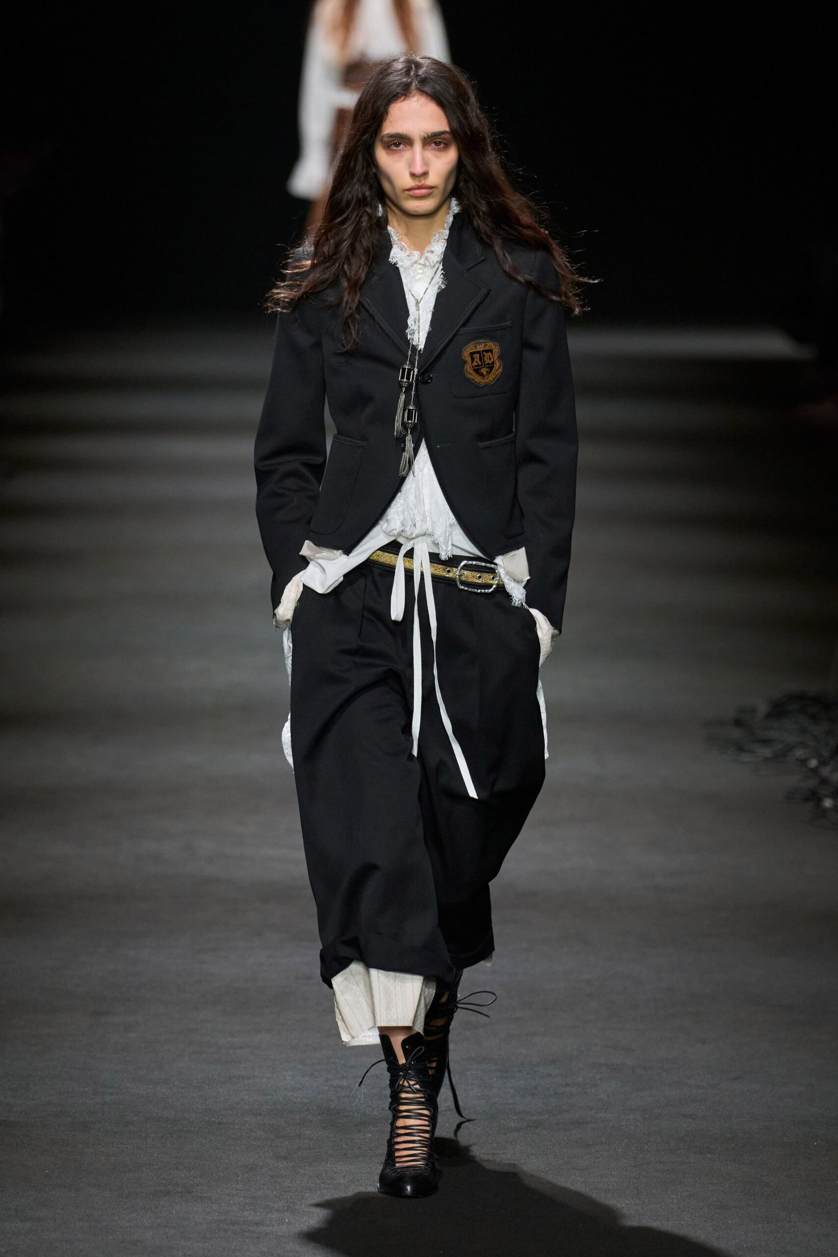 black tailored blazer with relaxed pants
