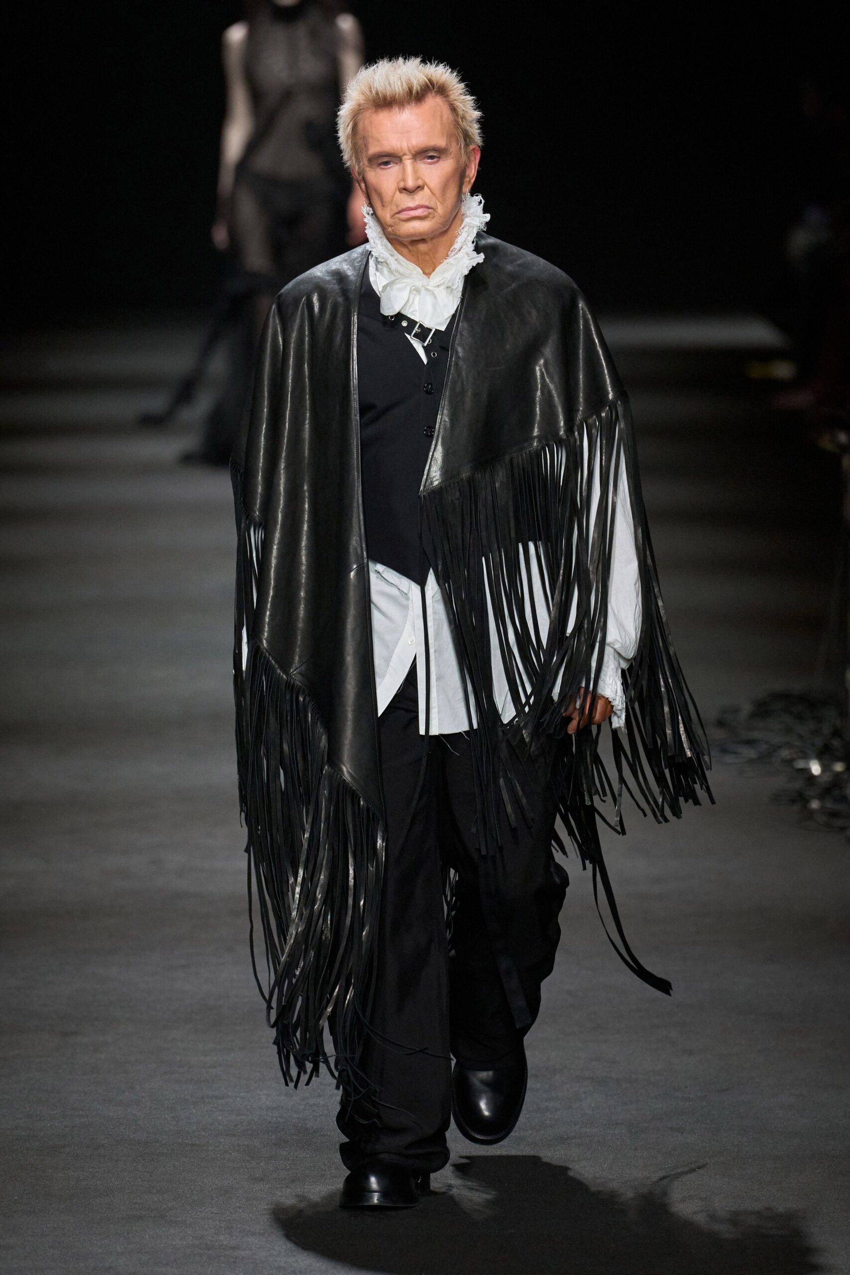 black leather cape with white shirt
