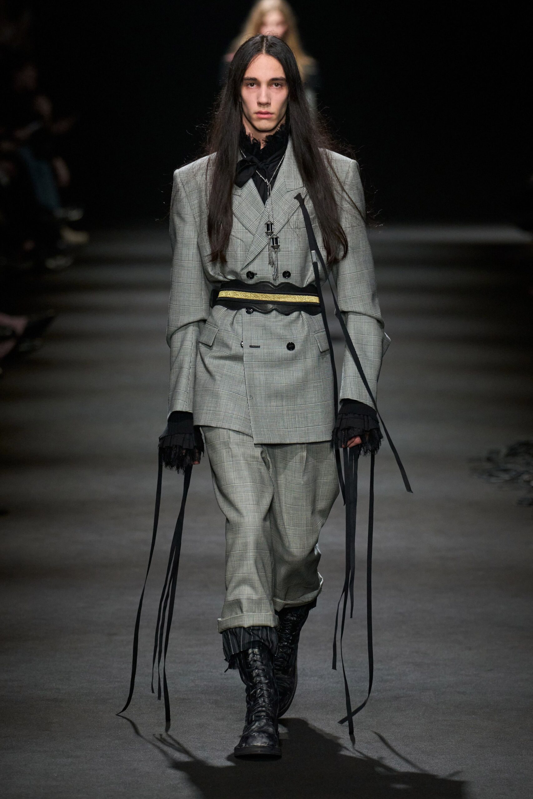 gray tailored suit with boots