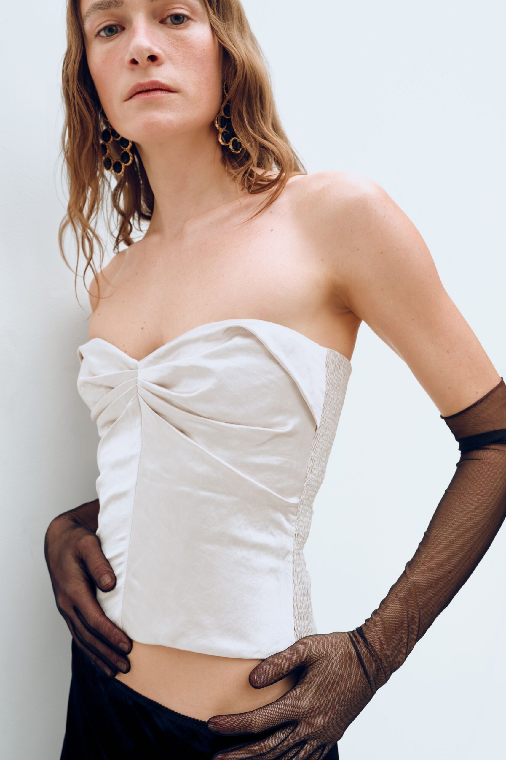 white silk strapless fitted pleated bustier