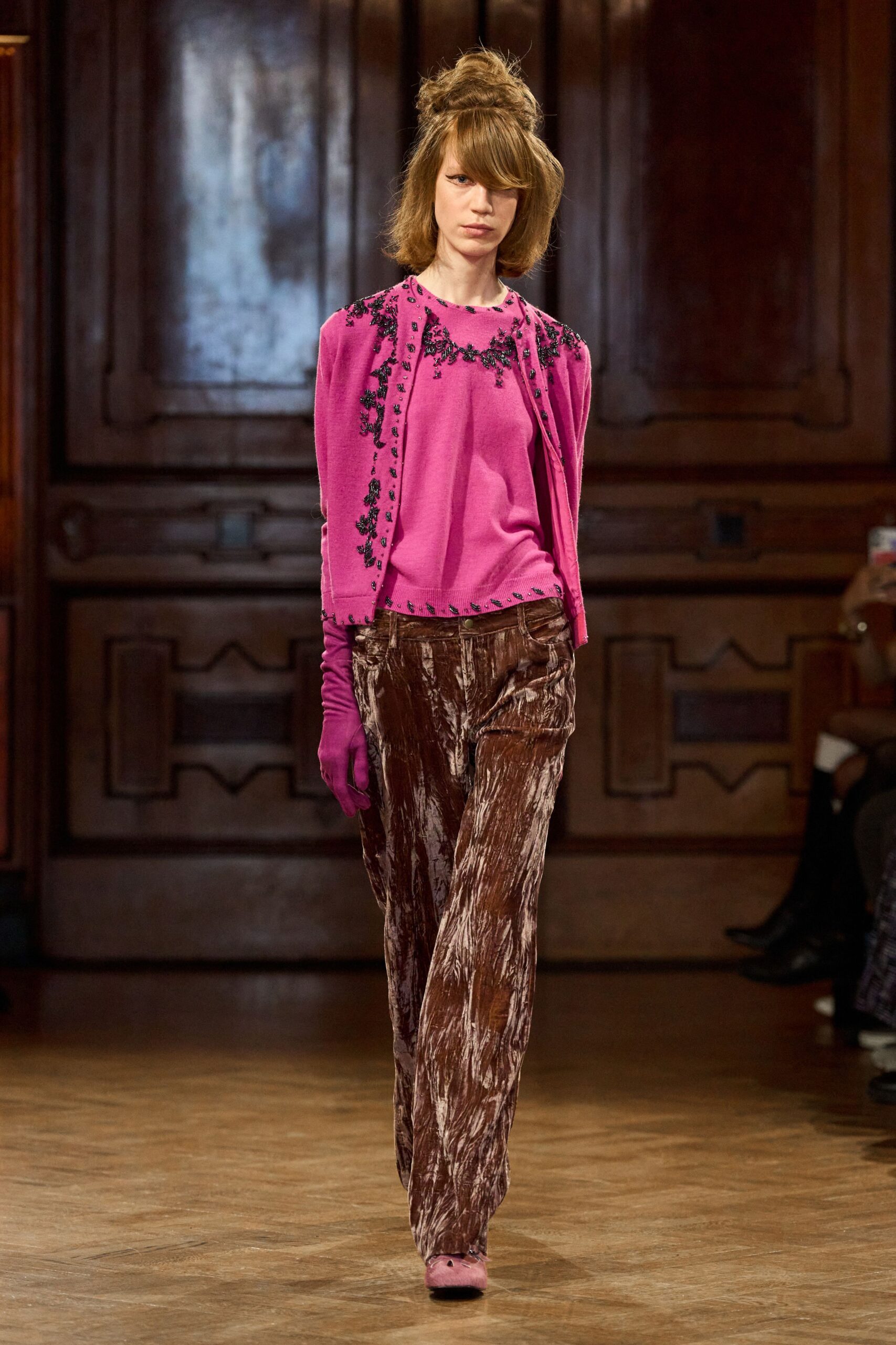 pink embroidered top with flared pants
