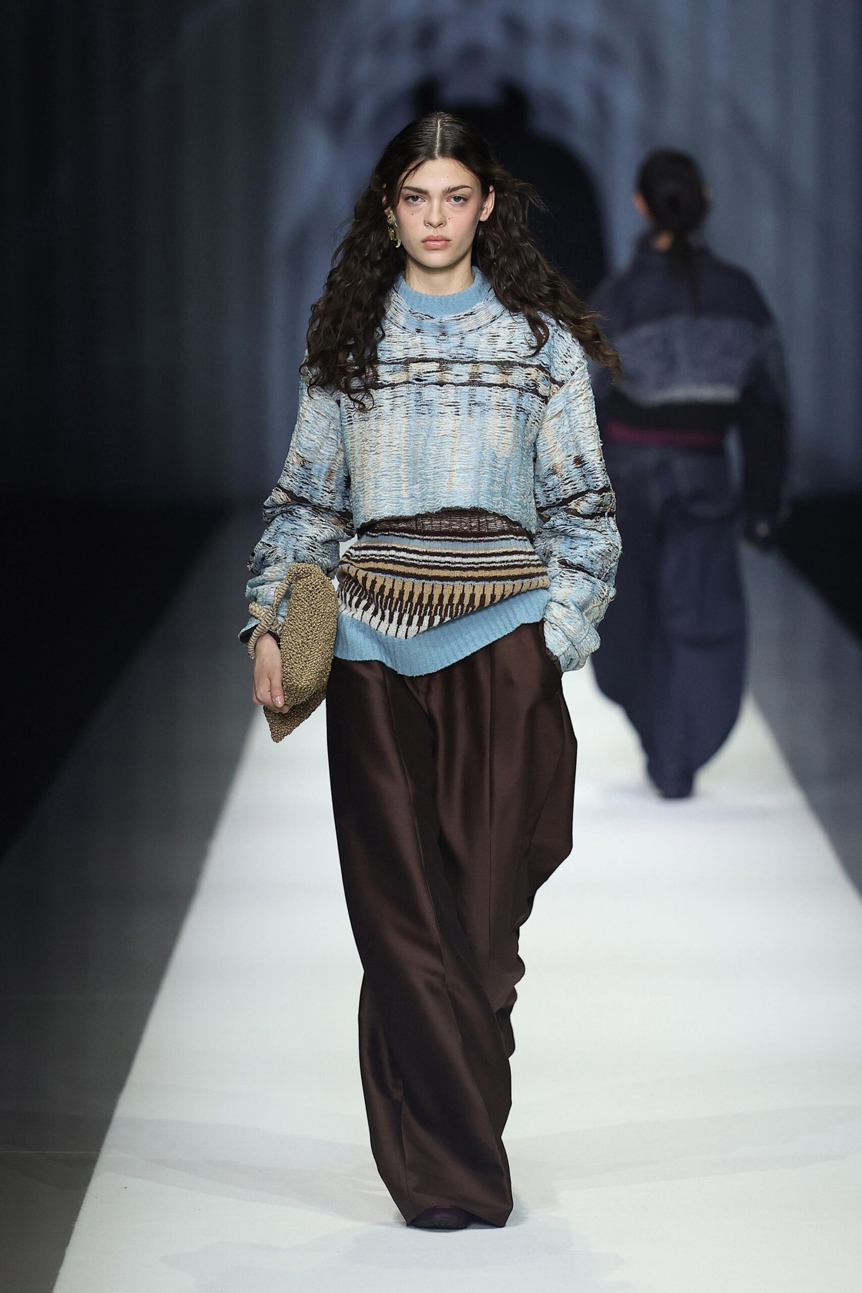 blue relaxed sweater with brown pants
