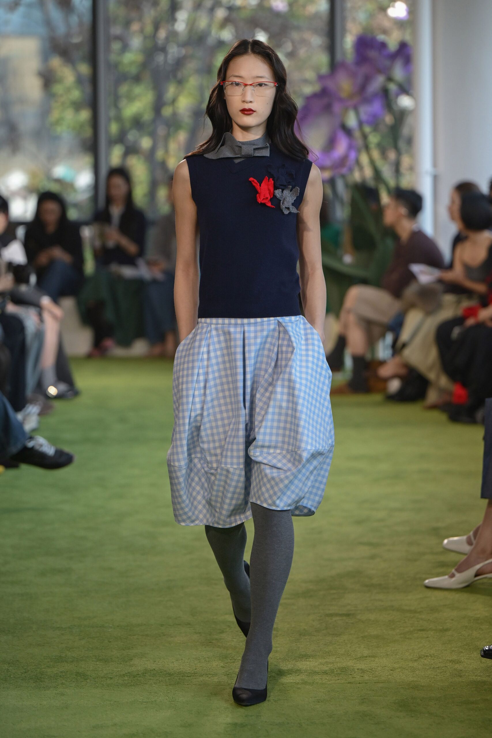 blue sleeveless high-neck fitted embroidered top