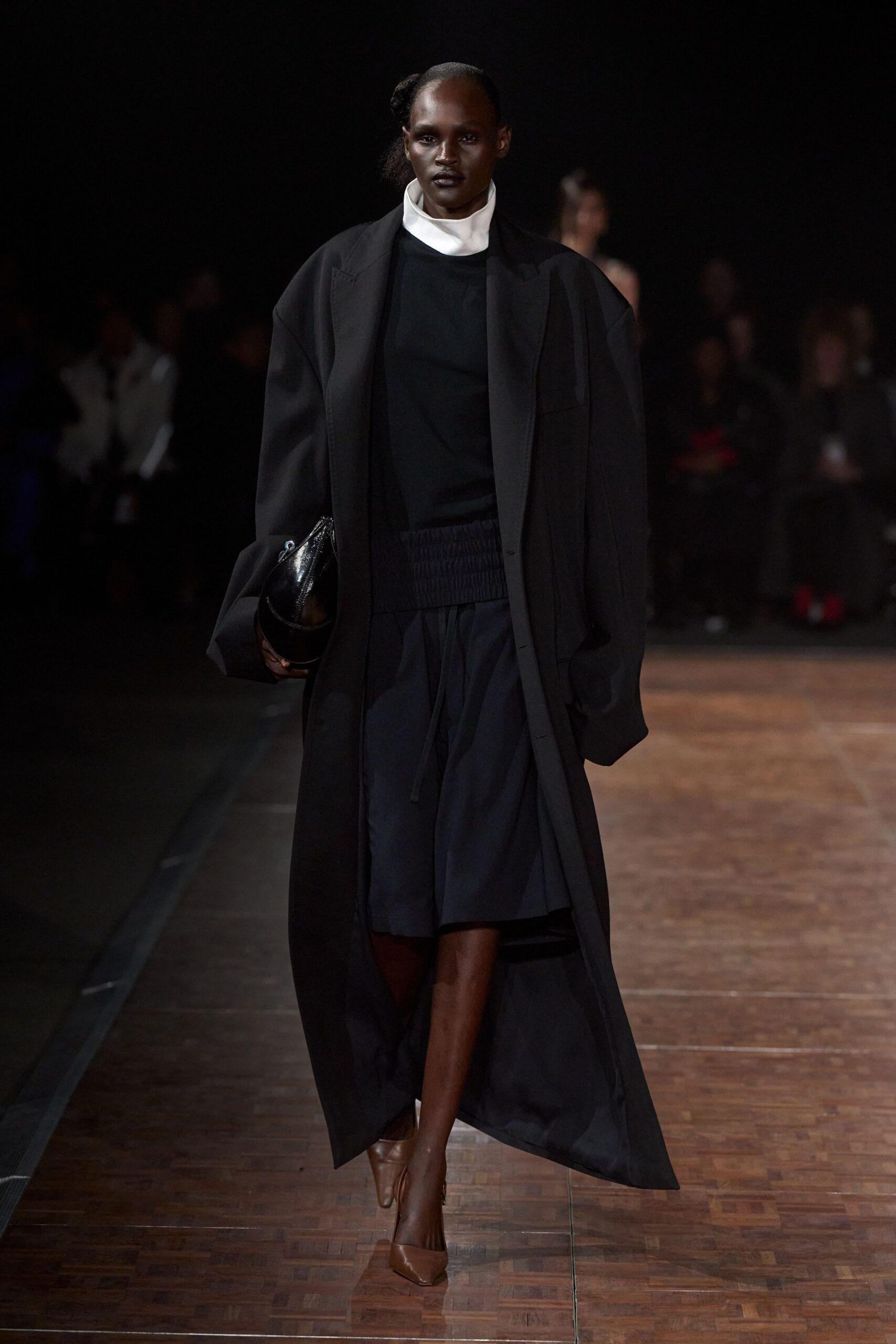 black wool long-sleeve collared oversized coat