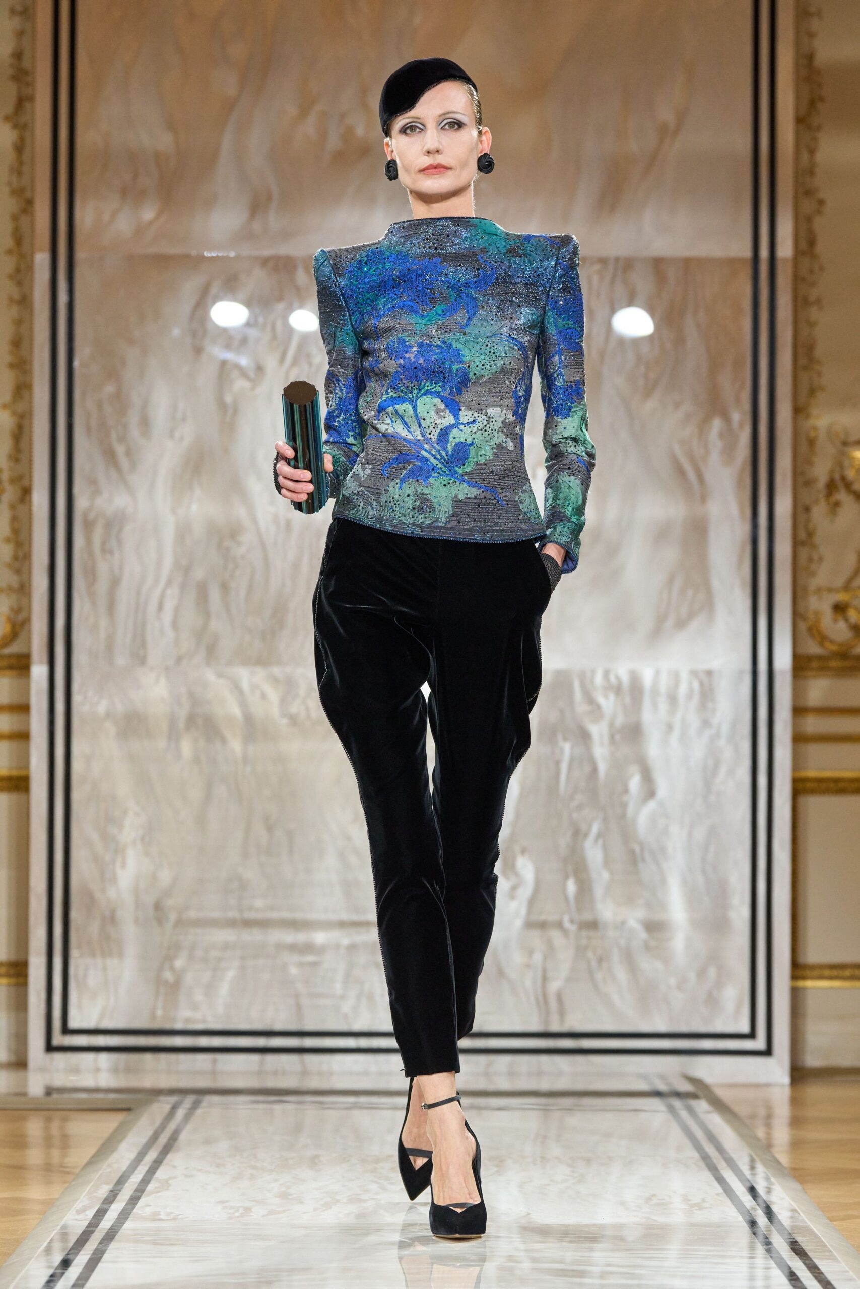 fitted blue green printed top with black pants