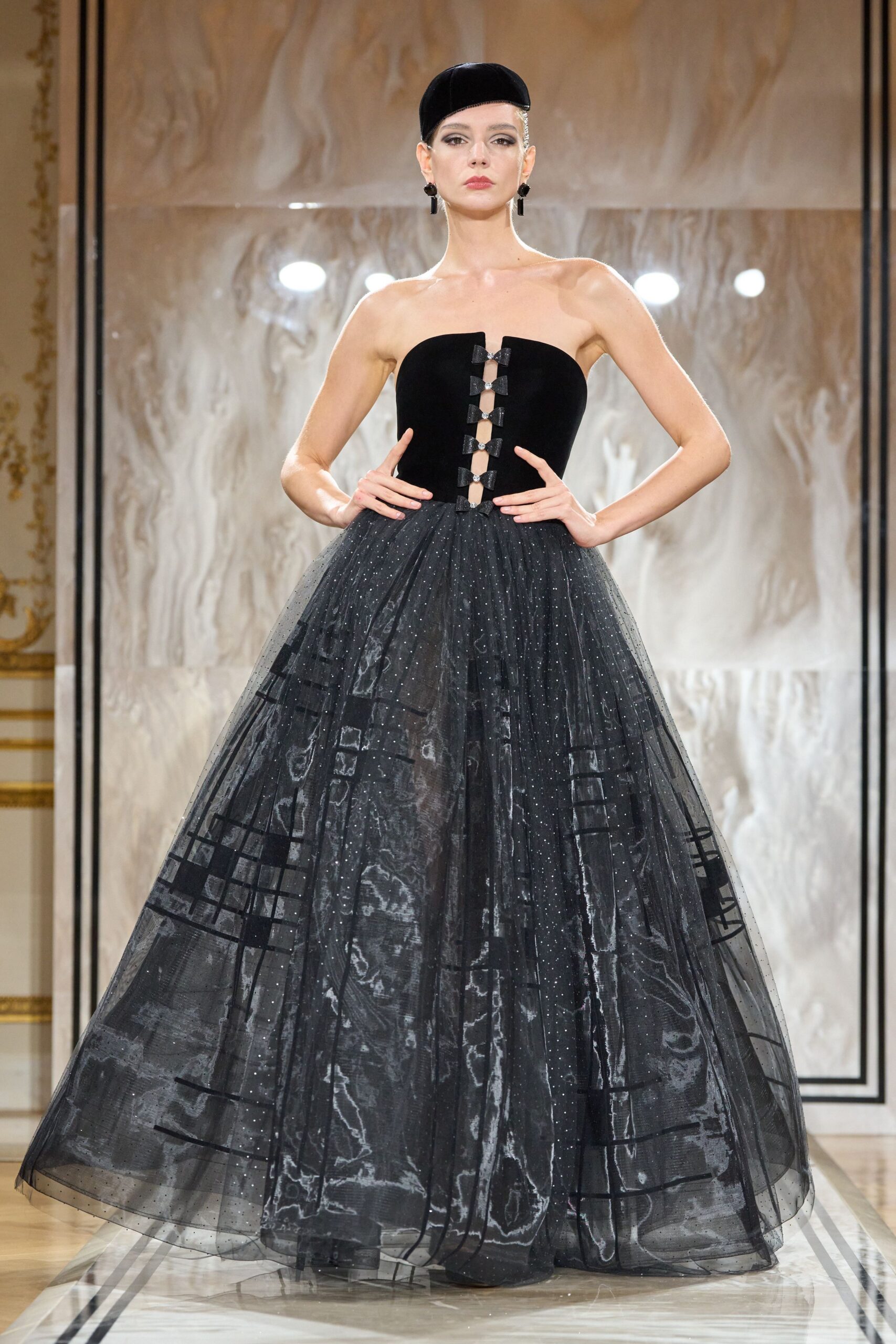 black strapless pleated gown