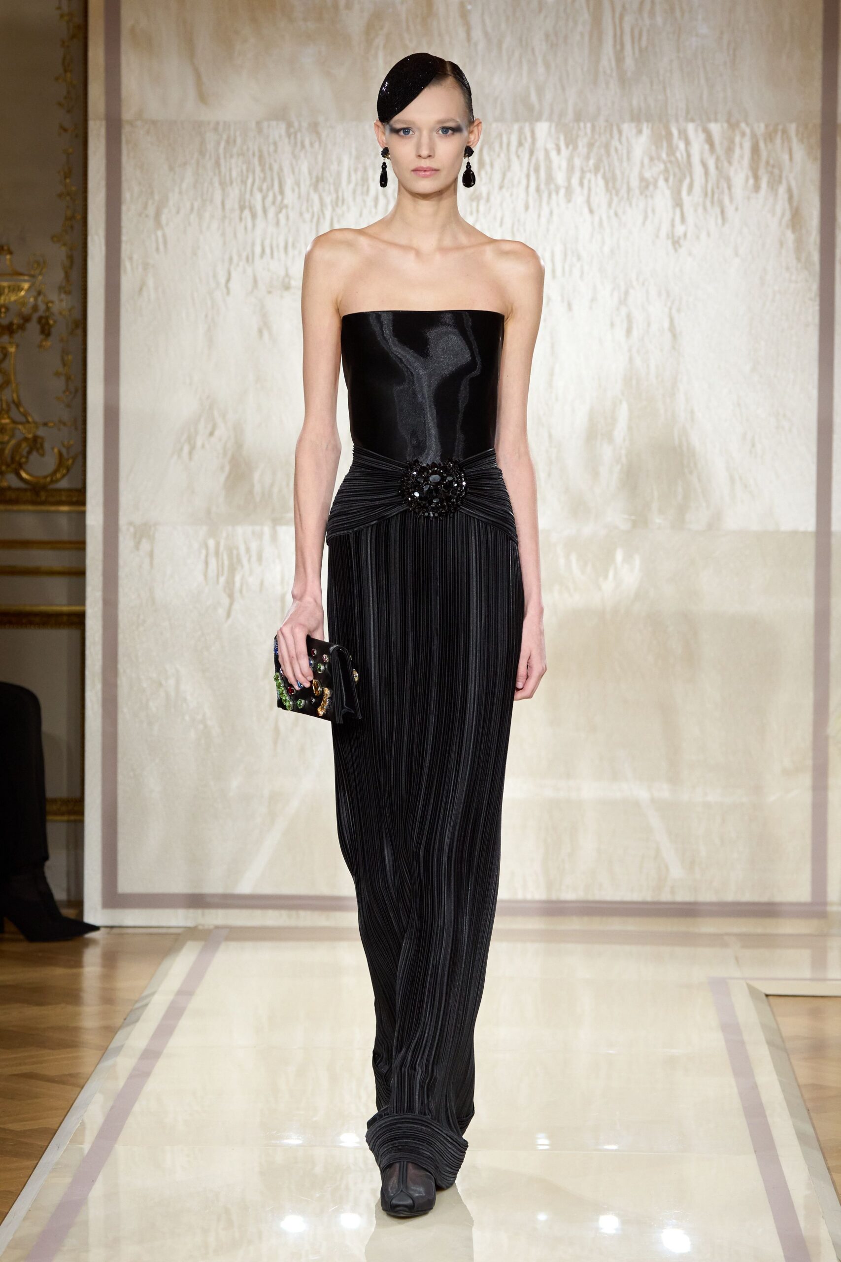 black strapless pleated gown