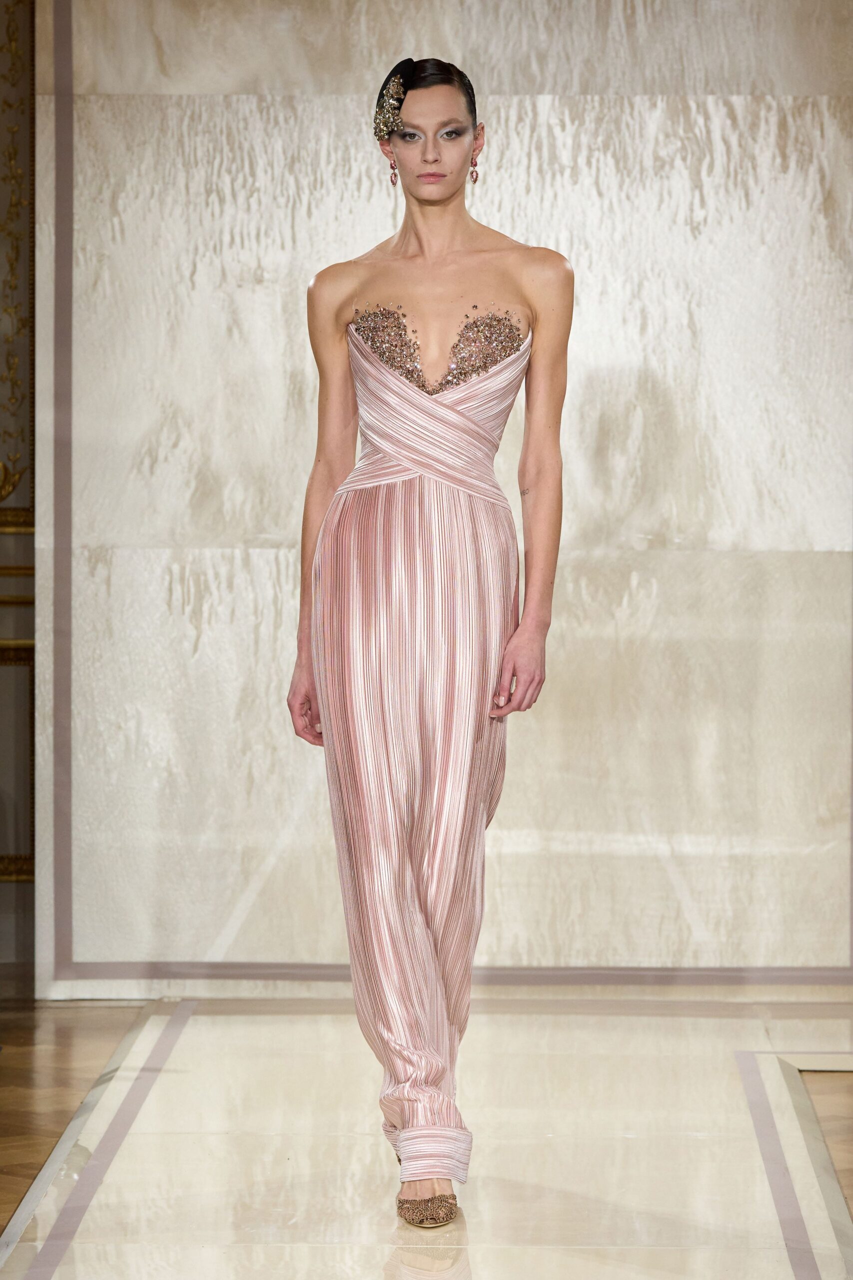 pink silk strapless fitted pleated embellished flowing gown