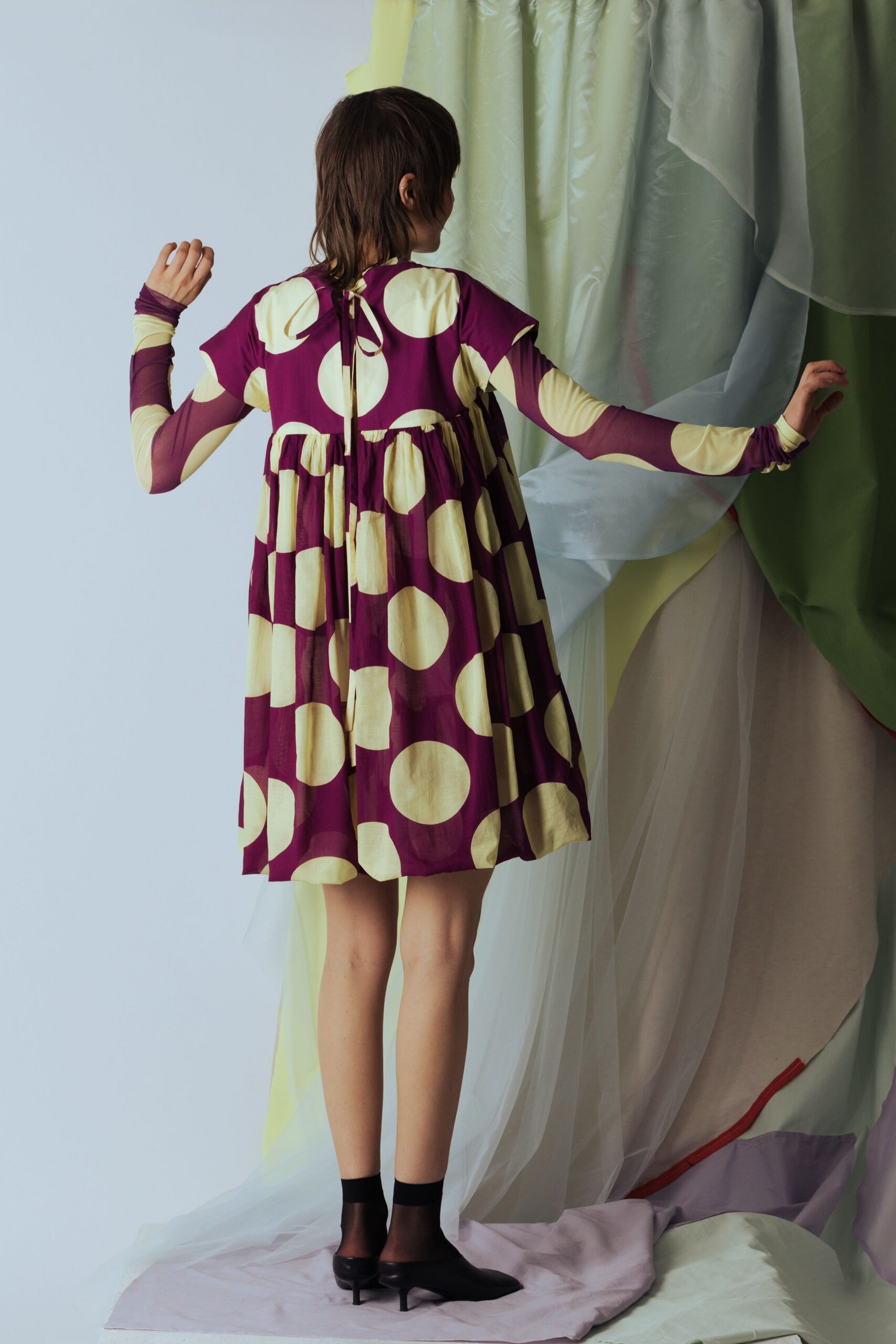 purple polka-dot mini dress
