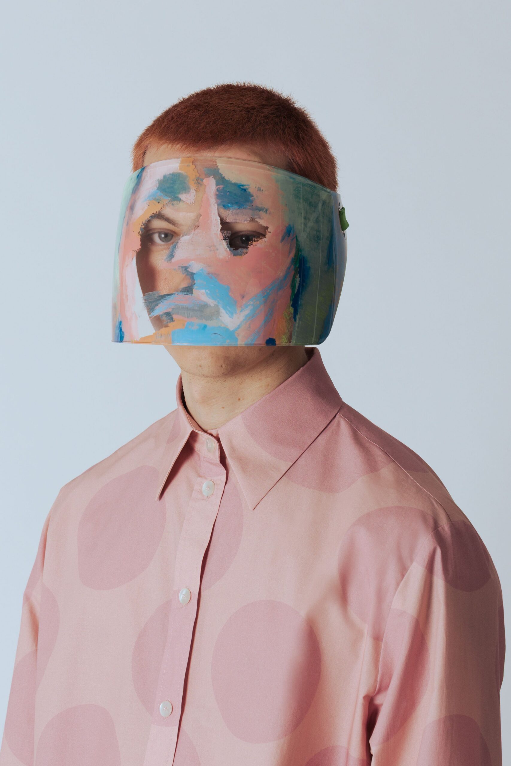 pink polka-dot shirt with clear hat